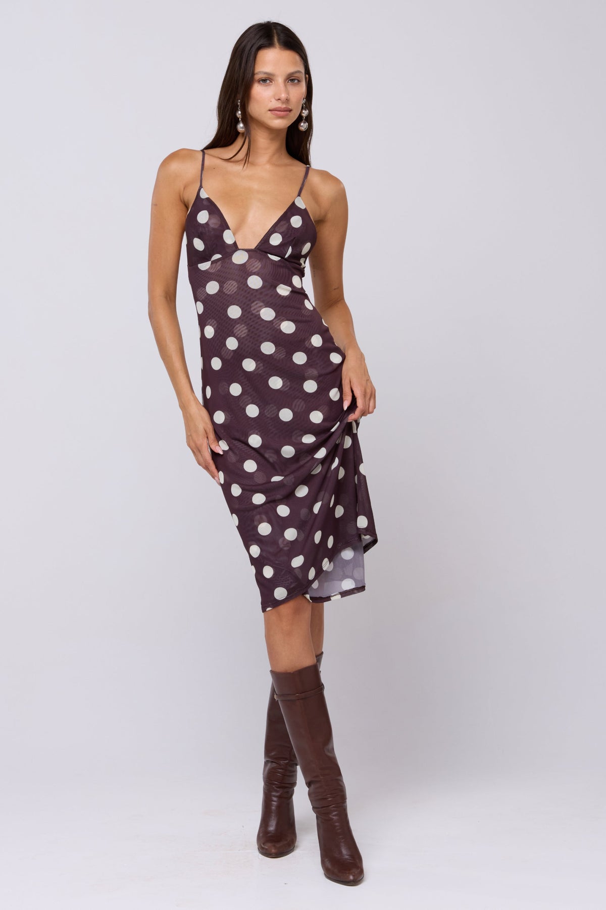 This is an image of Matilda Midi Dress in Polo - RESA featuring a model wearing the dress
