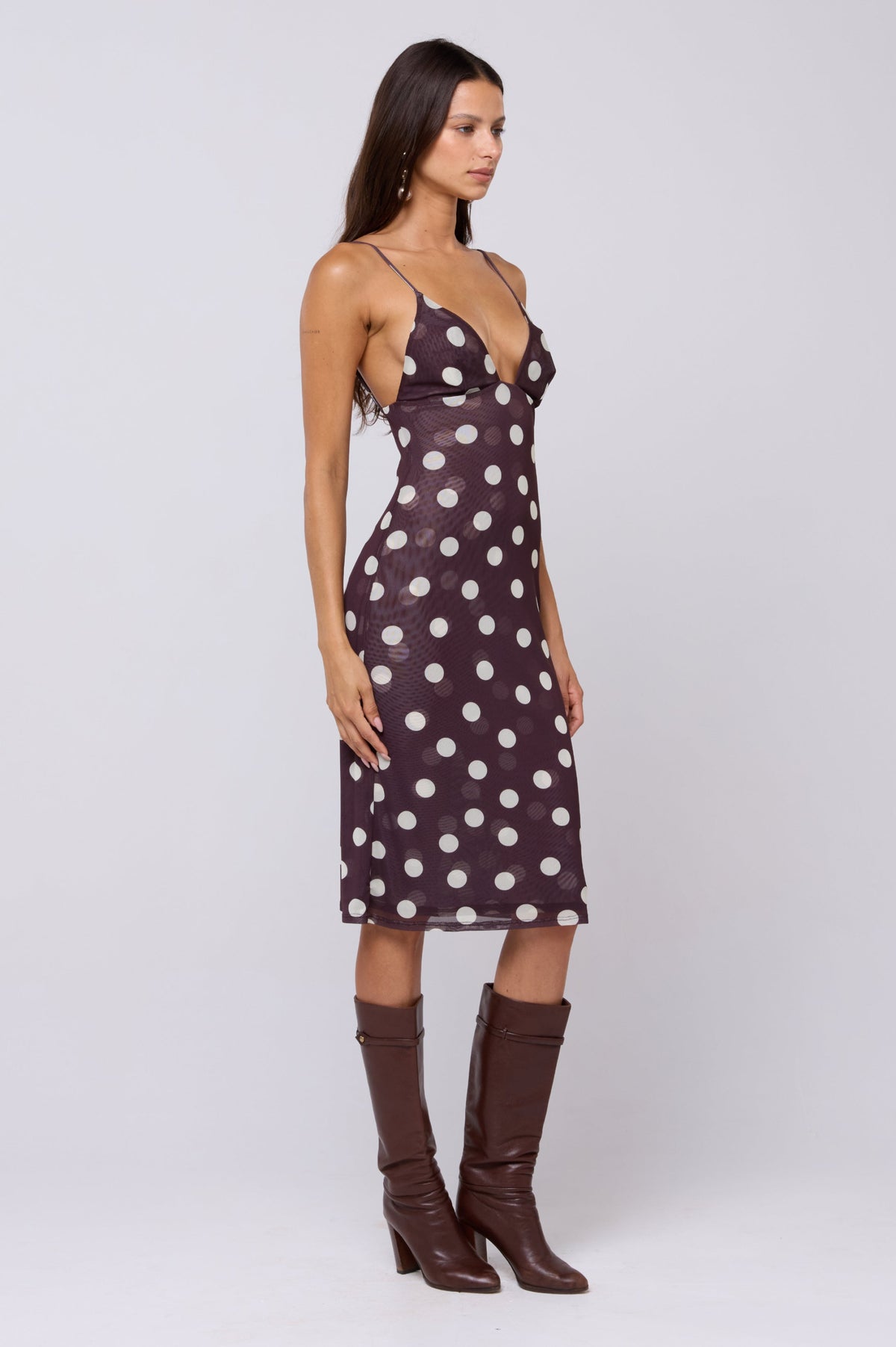 This is an image of Matilda Midi Dress in Polo - RESA featuring a model wearing the dress