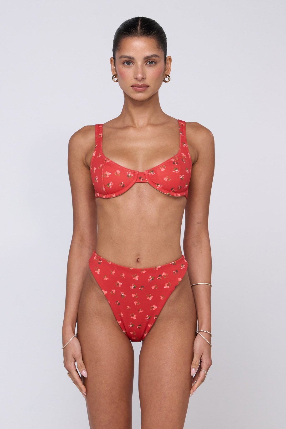 This is an image of Matty Bikini Top in Cayenne - RESA featuring a model wearing the dress