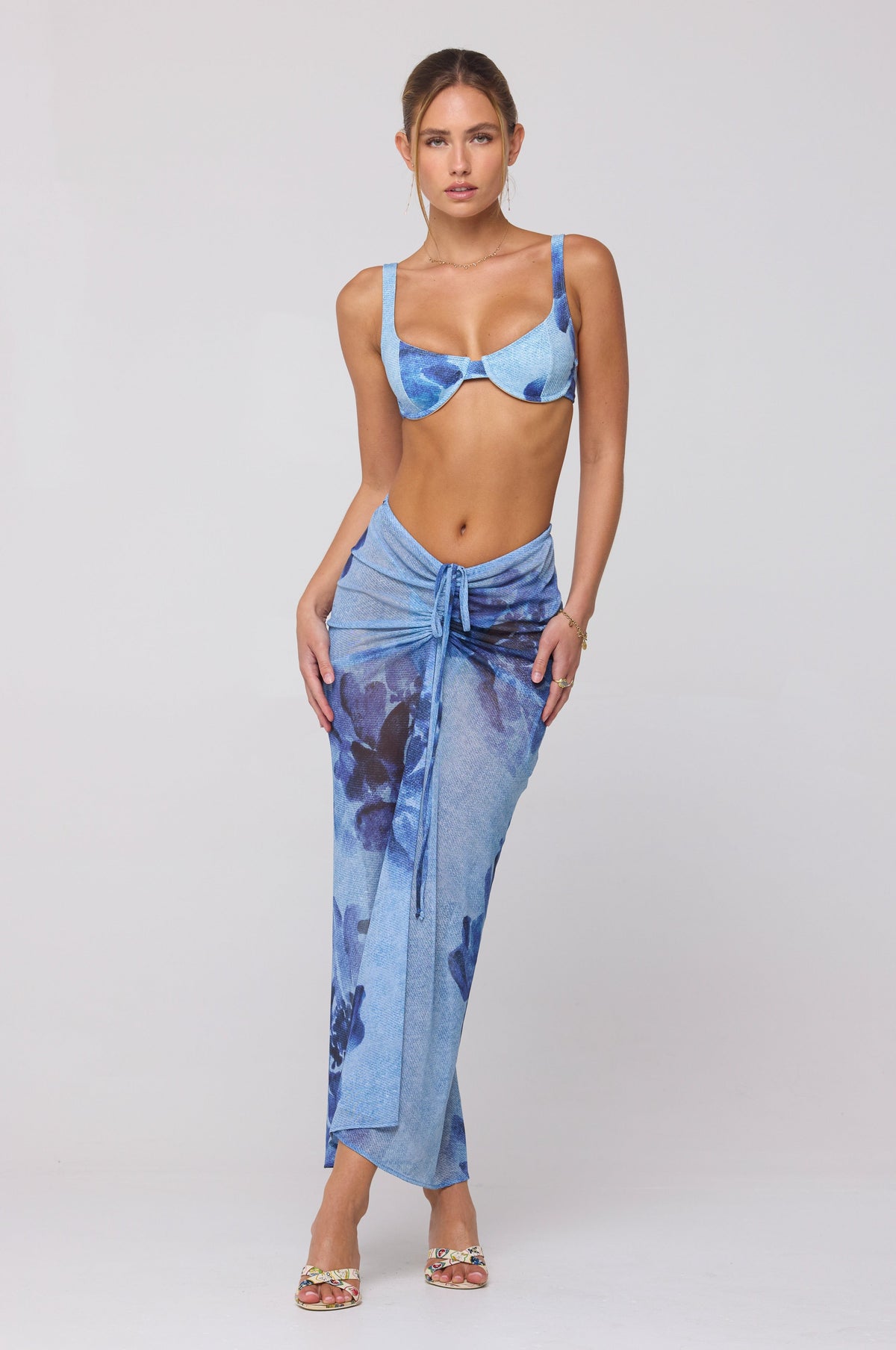 This is an image of Matty Bikini Top in Indigo - RESA featuring a model wearing the dress