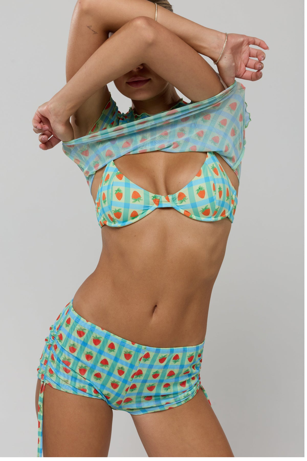 This is an image of Matty Bikini Top in Juicy - RESA featuring a model wearing the dress