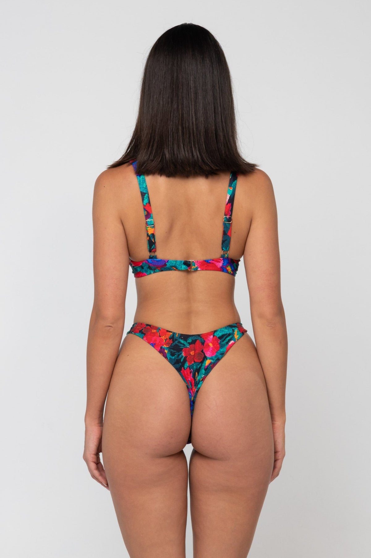 This is an image of Matty Bikini Top in Resort - RESA featuring a model wearing the dress