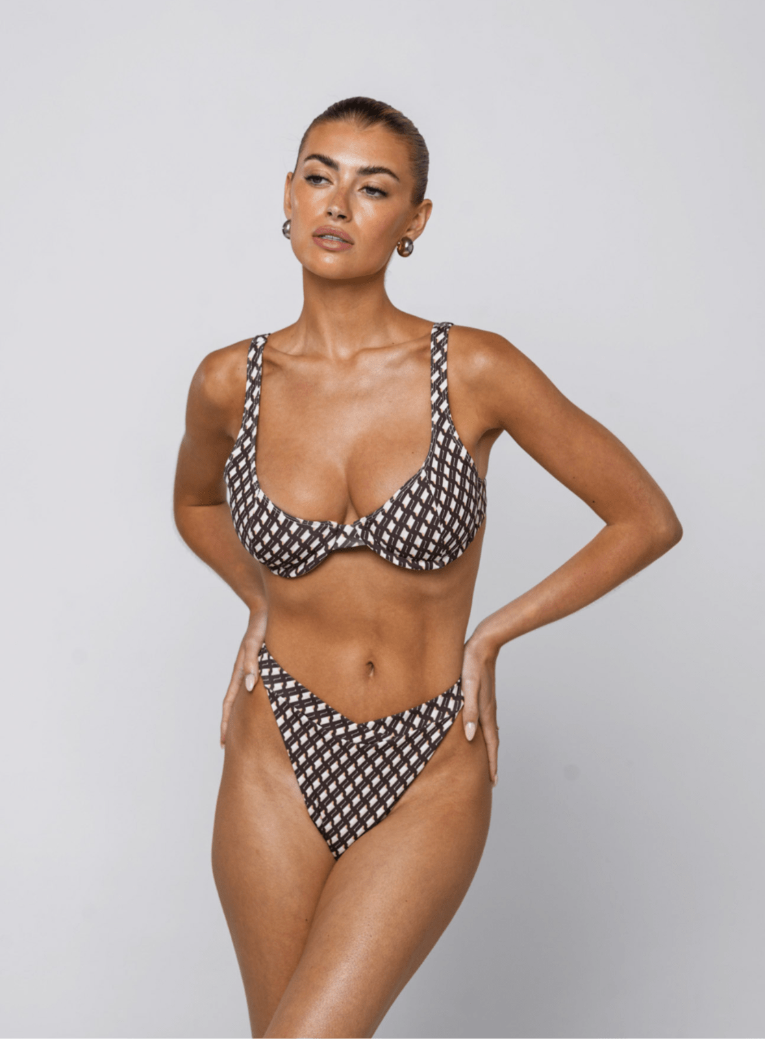 This is an image of Matty Bikini Top in Tulum - RESA featuring a model wearing the dress
