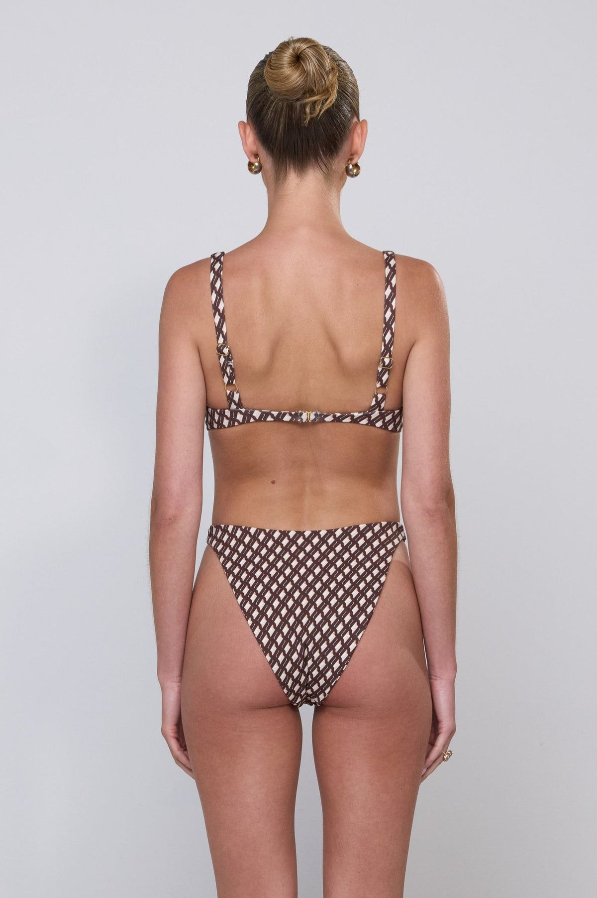 This is an image of Matty Bikini Top in Tulum - RESA featuring a model wearing the dress