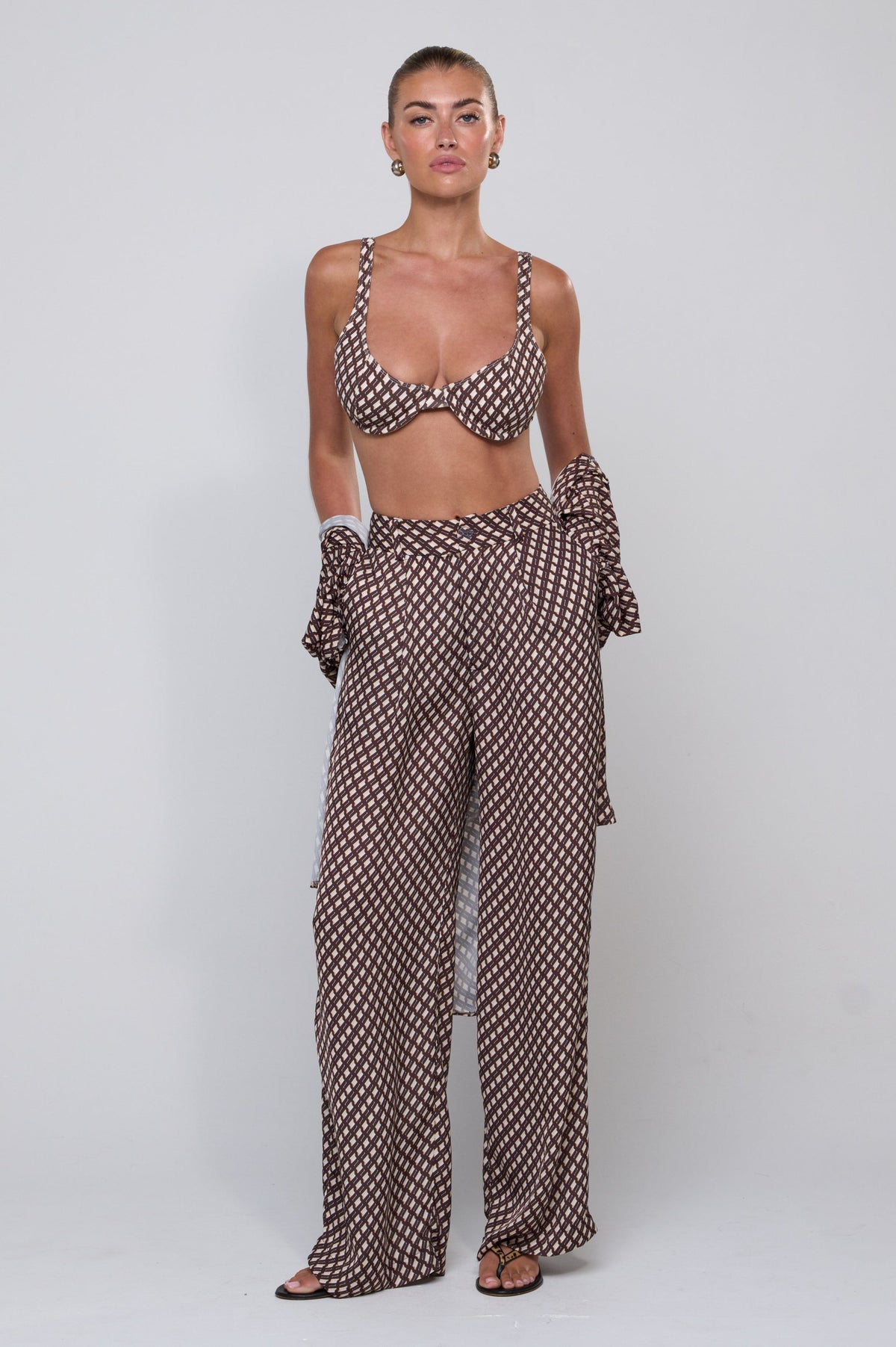 This is an image of Matty Bikini Top in Tulum - RESA featuring a model wearing the dress