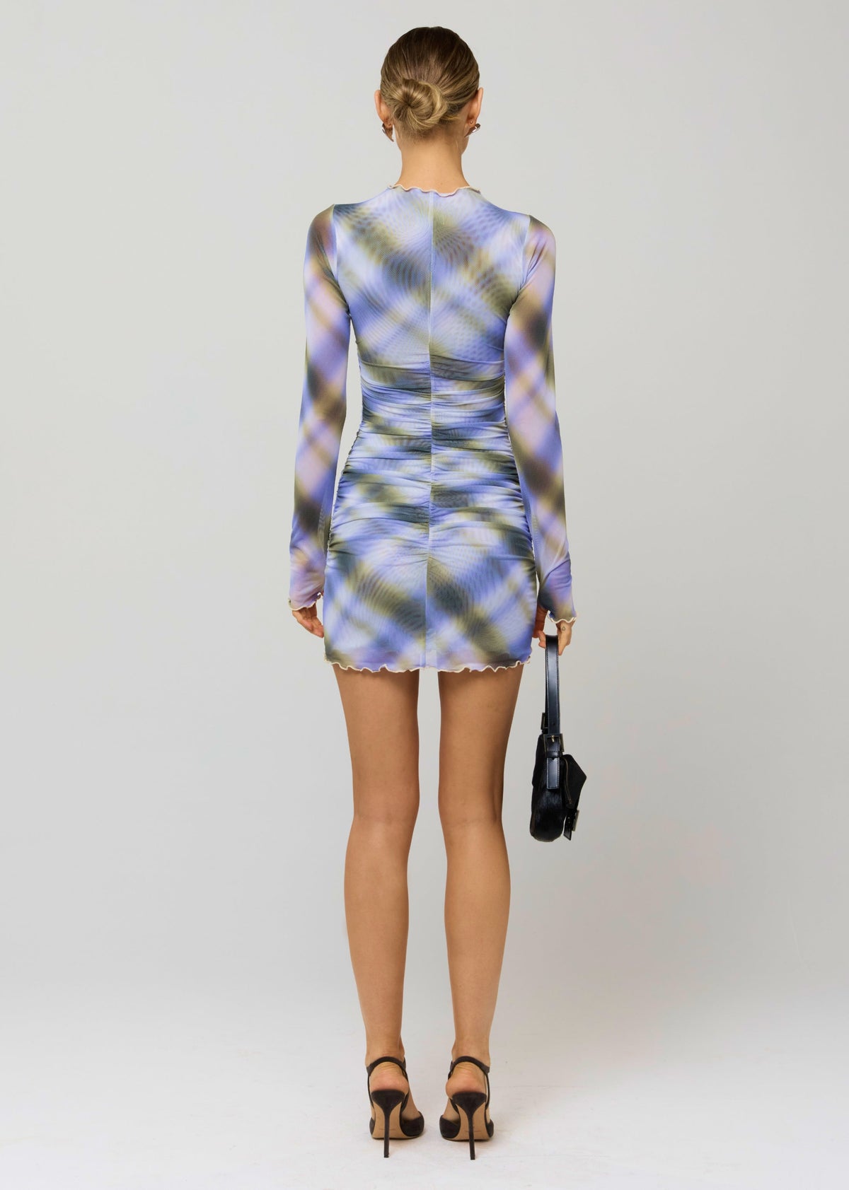 This is an image of Mecca Dress in Blur - RESA featuring a model wearing the dress