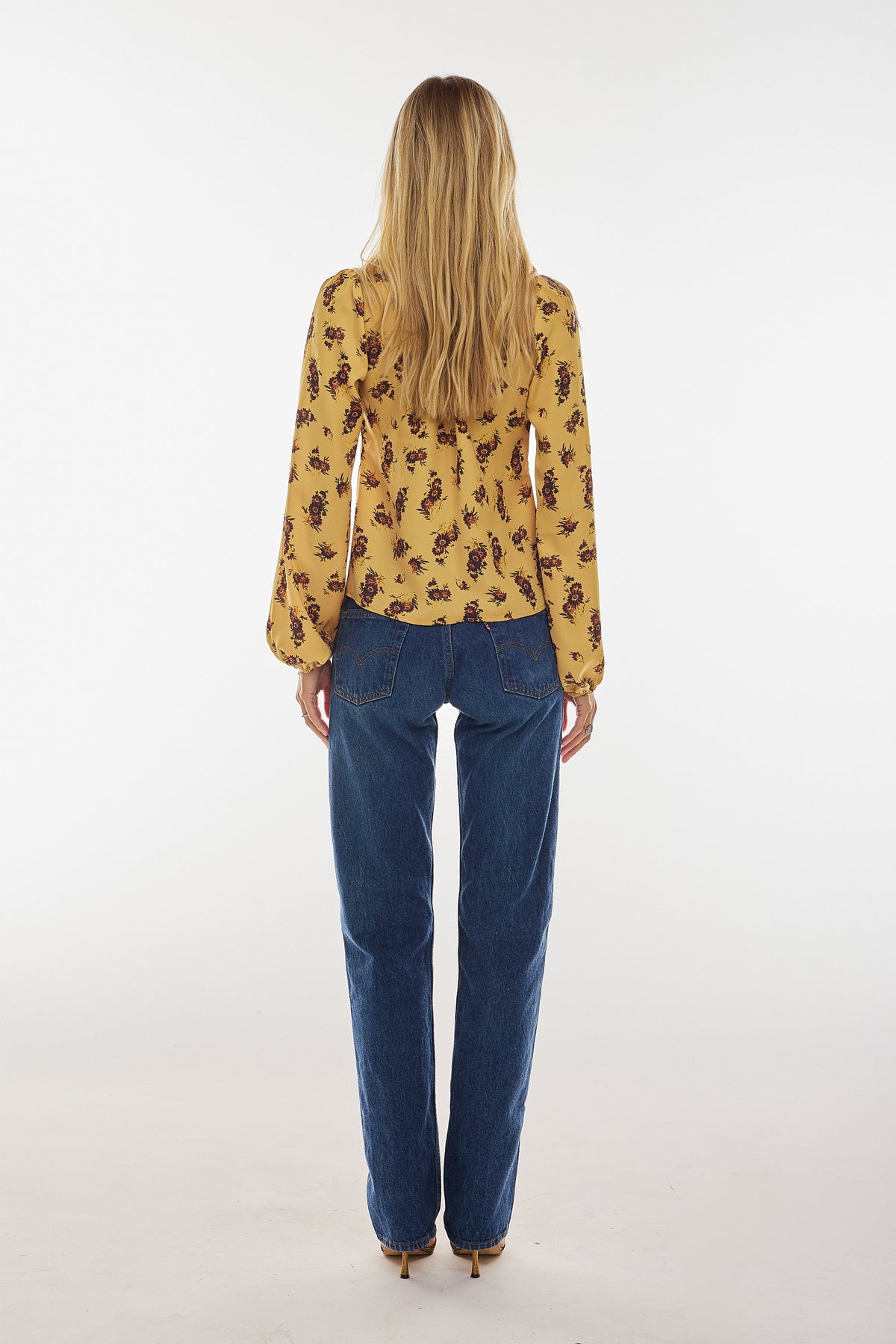 This is an image of Meg Blouse in Dandelion - RESA featuring a model wearing the dress