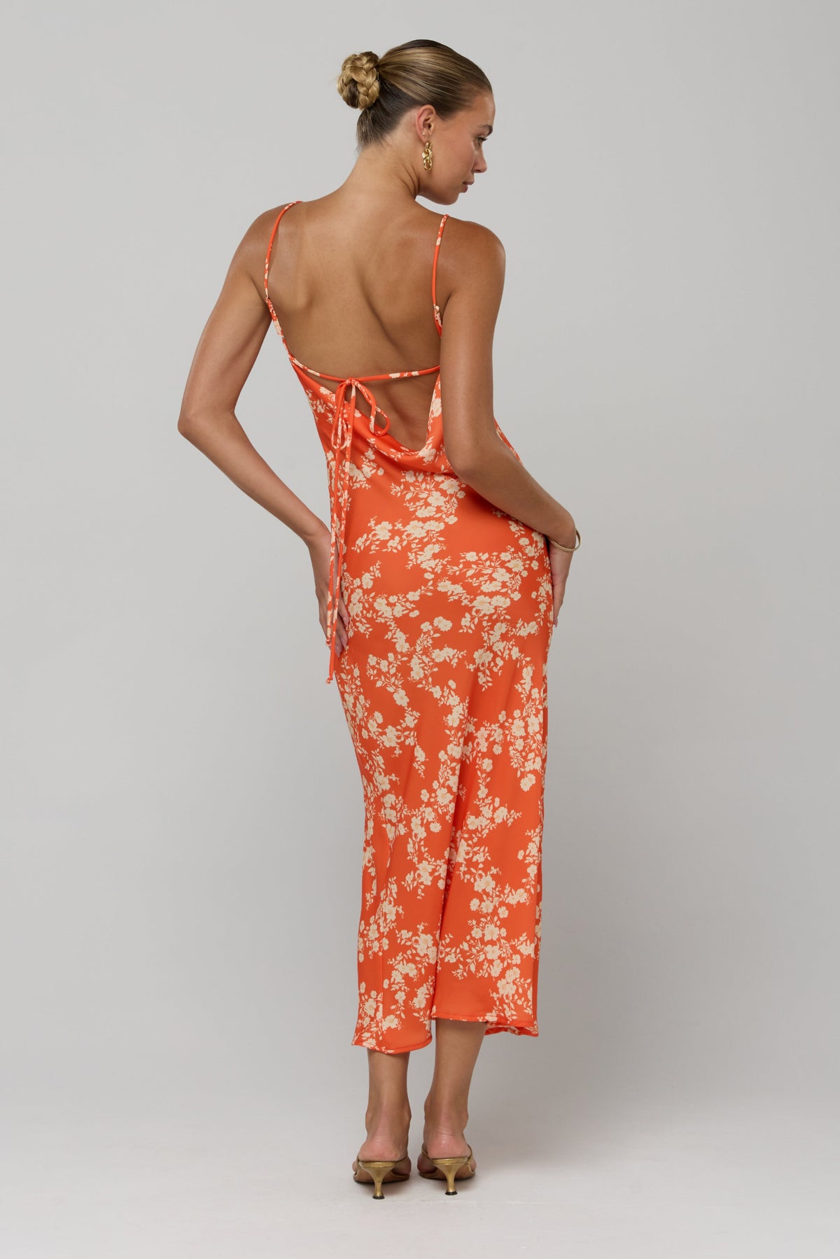 This is an image of Meryl in Orange Blossom - RESA featuring a model wearing the dress