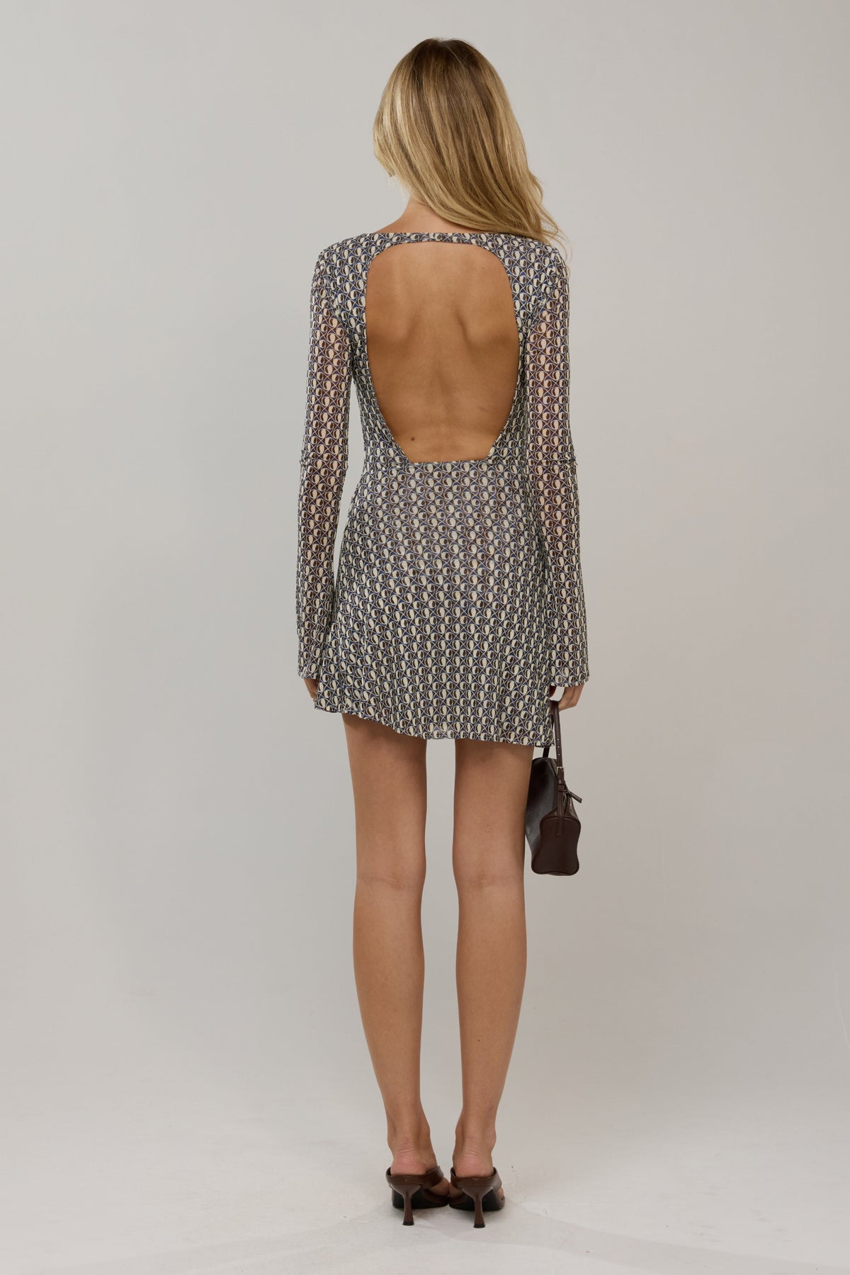 This is an image of Mia in Prism - RESA featuring a model wearing the dress