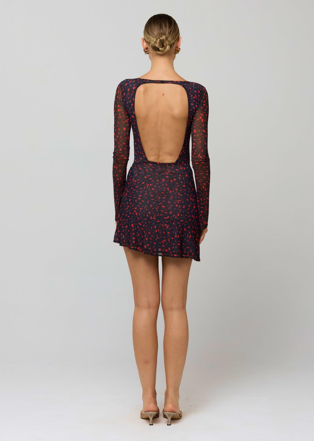 This is an image of Mia Mini Dress in Rouge - RESA featuring a model wearing the dress
