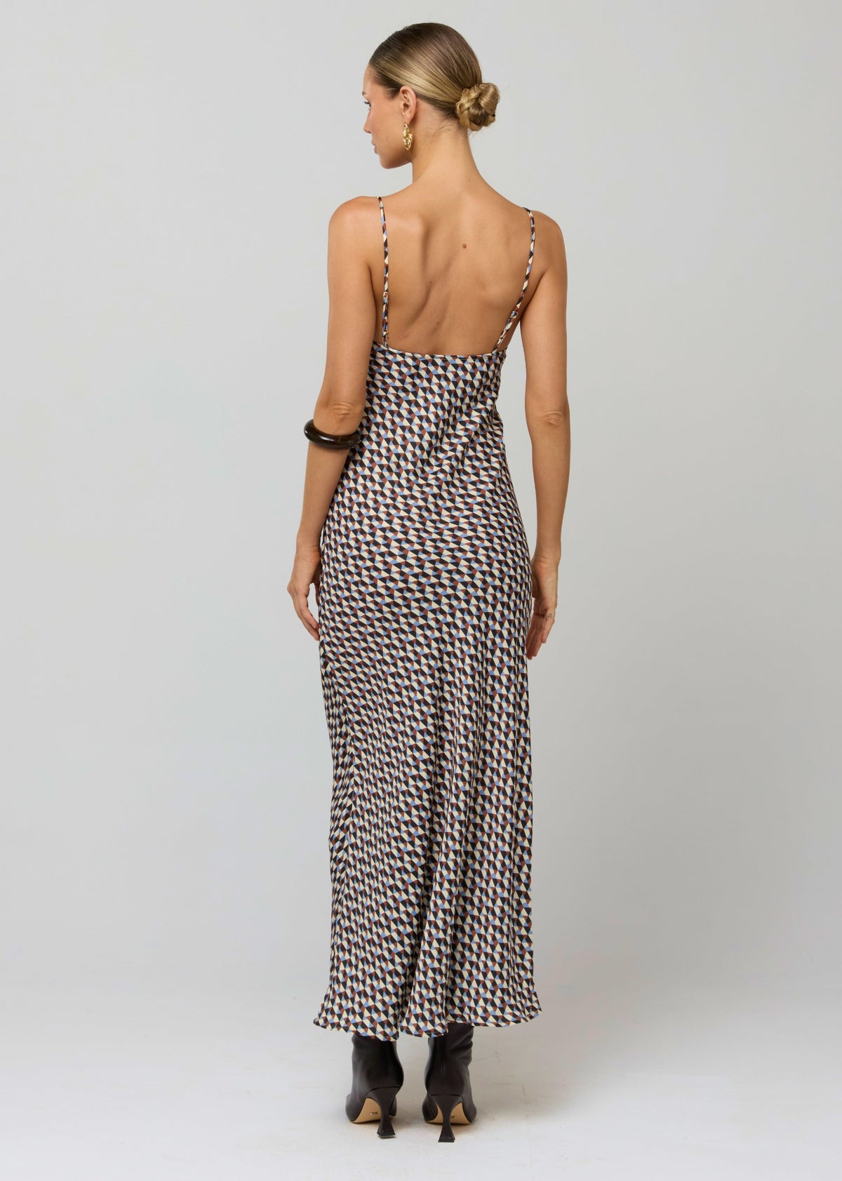 This is an image of Micah Dress in Mosaic - RESA featuring a model wearing the dress