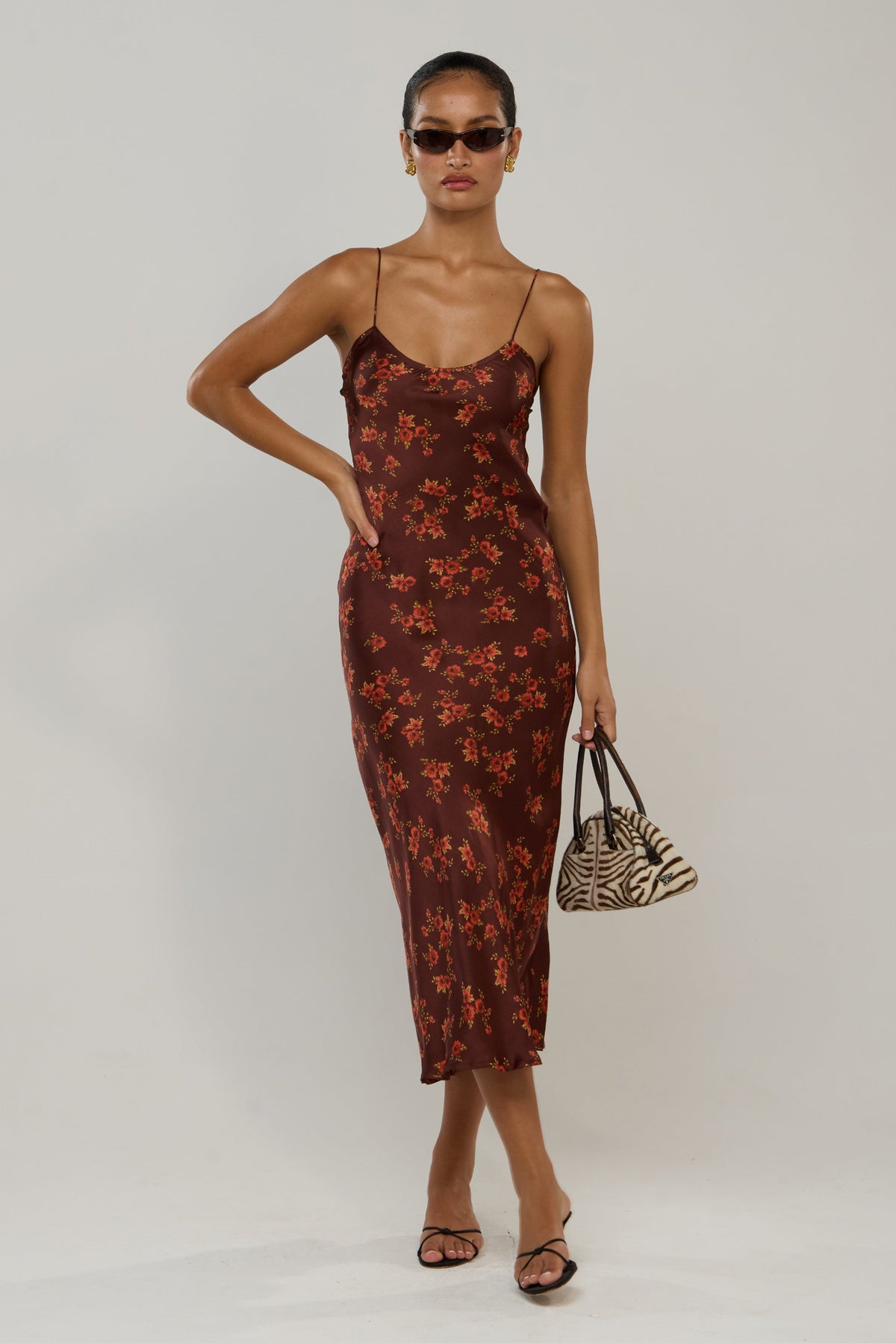 This is an image of Micah in Mulberry - RESA featuring a model wearing the dress