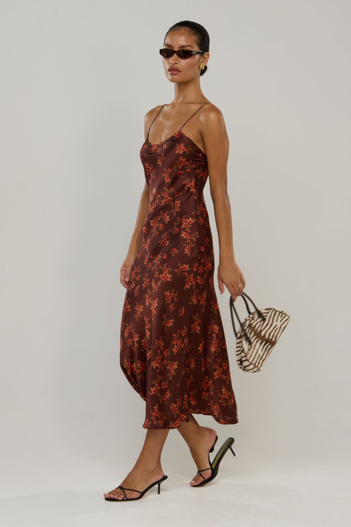 This is an image of Micah in Mulberry - RESA featuring a model wearing the dress