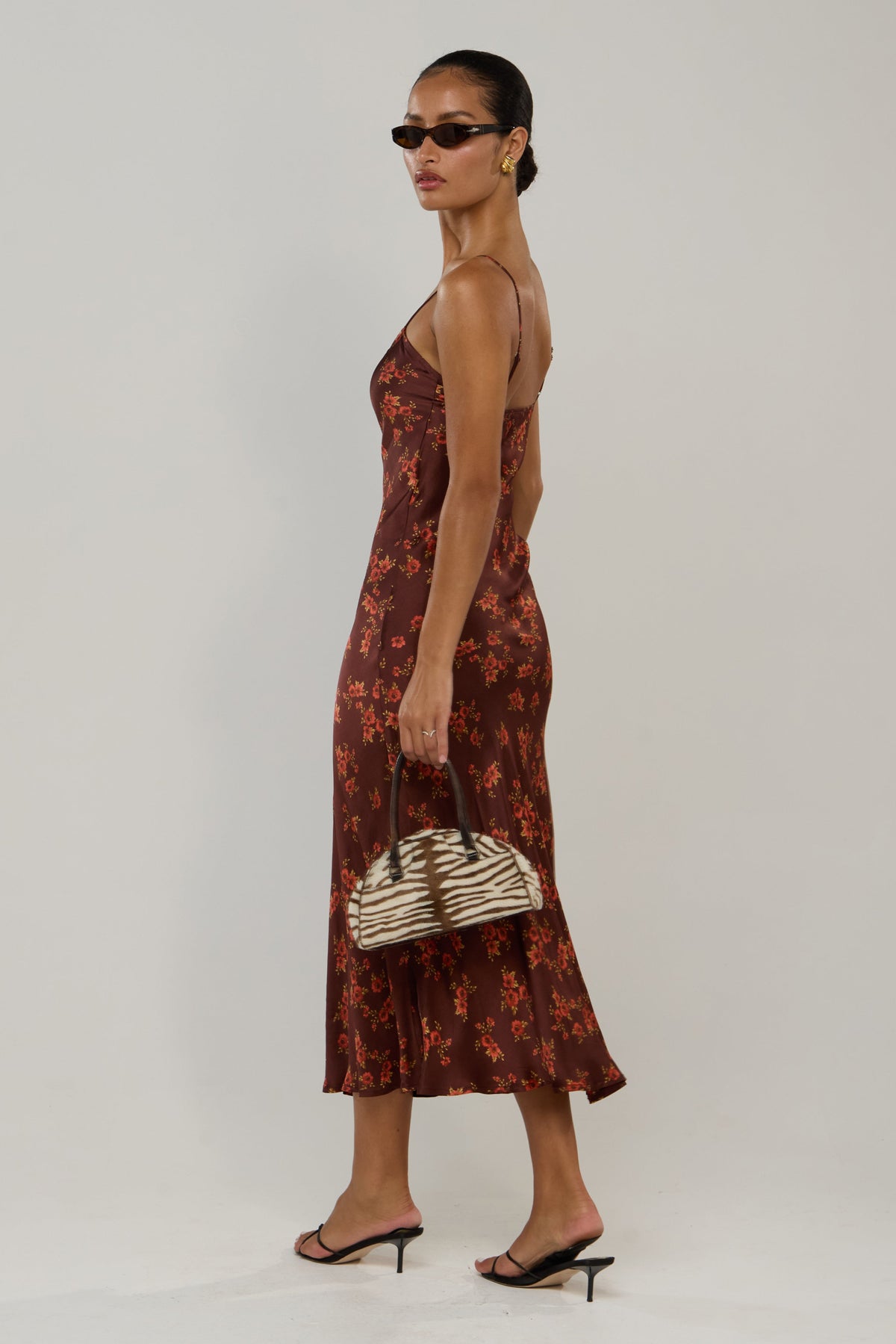 This is an image of Micah in Mulberry - RESA featuring a model wearing the dress