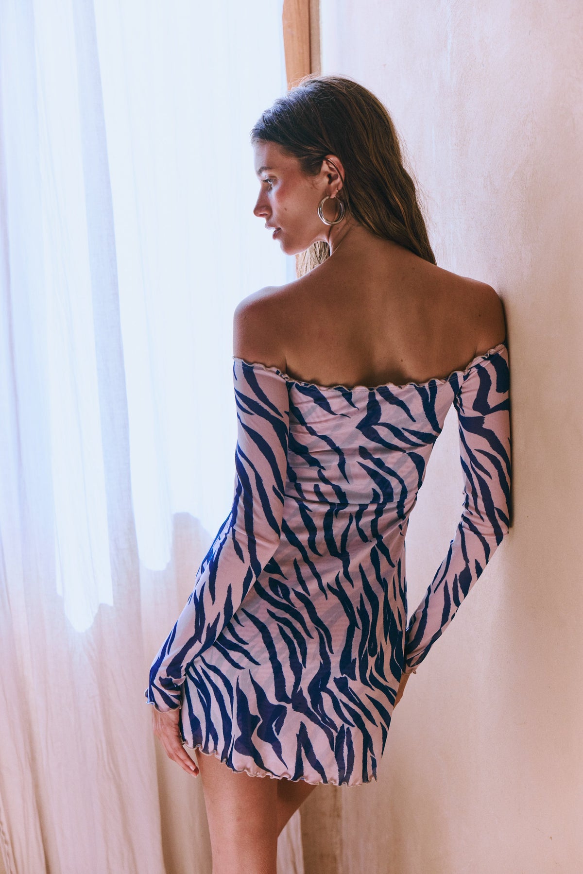 This is an image of Michelle Mini in Athens - RESA featuring a model wearing the dress