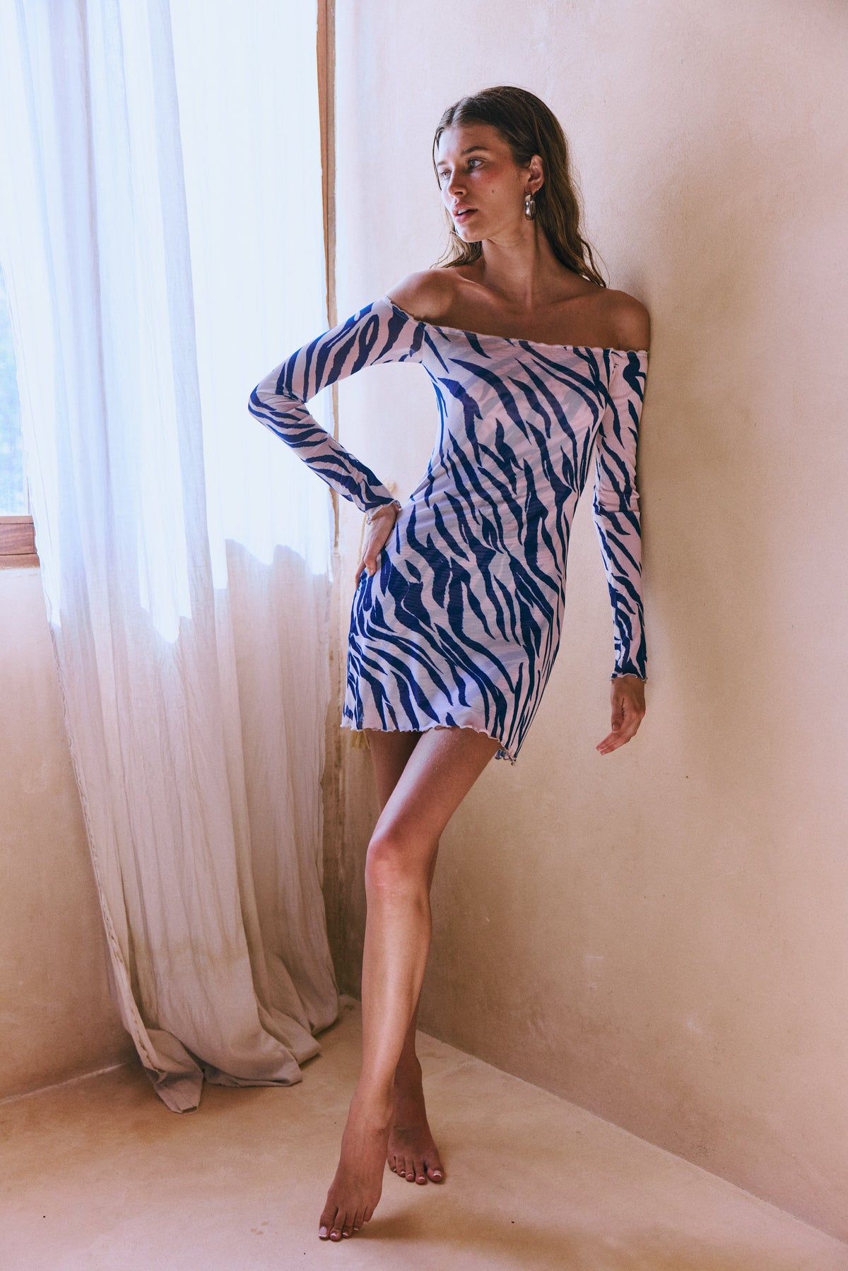 This is an image of Michelle Mini in Athens - RESA featuring a model wearing the dress