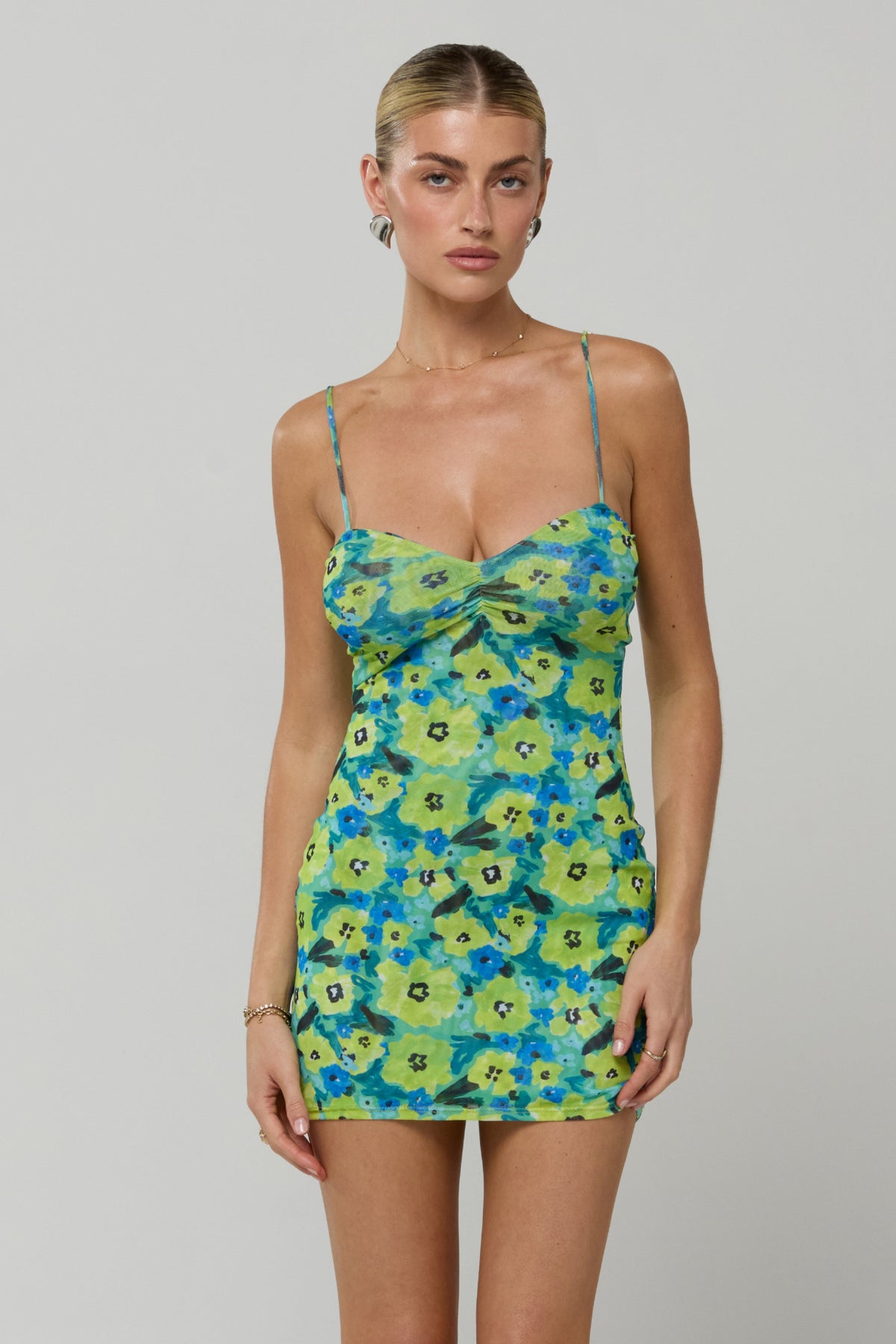 This is an image of Micro Mini dress in Blue Crush - RESA featuring a model wearing the dress
