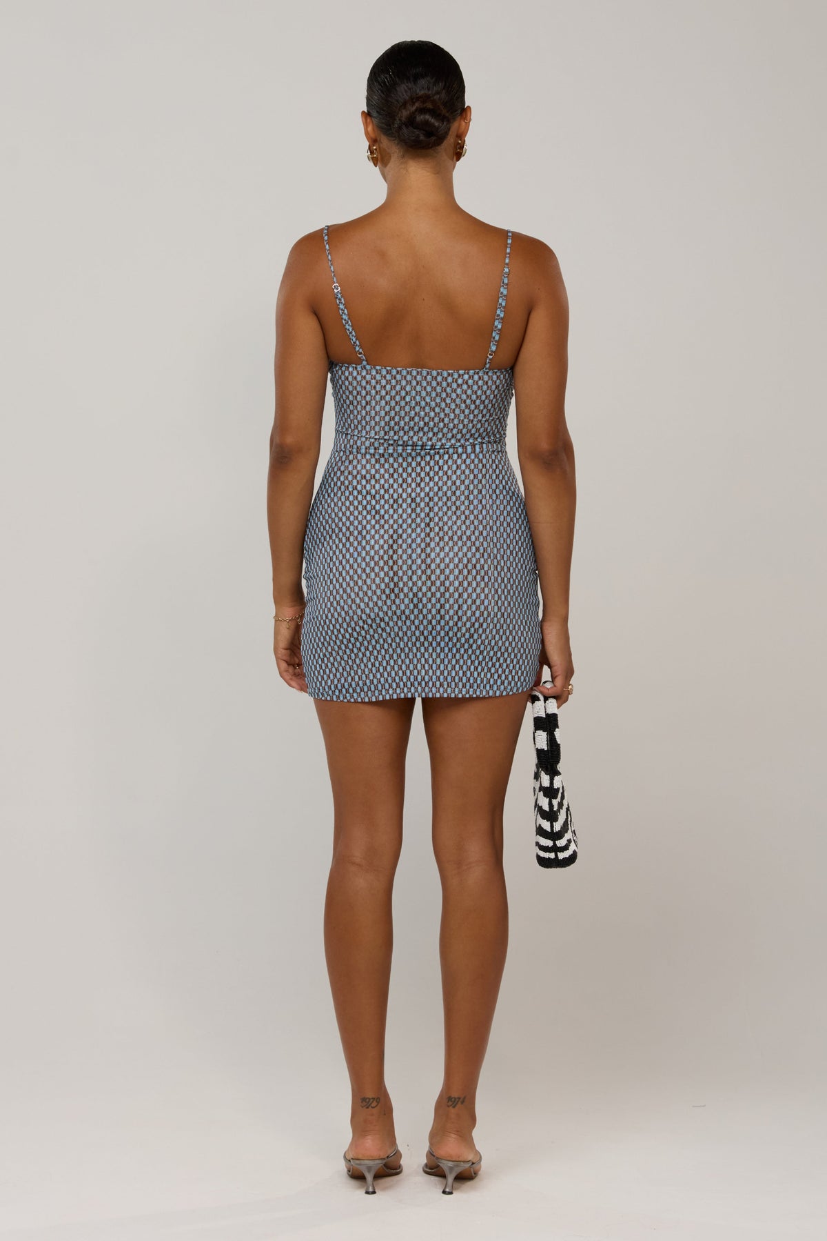 This is an image of Micro Mini in Swell - RESA featuring a model wearing the dress