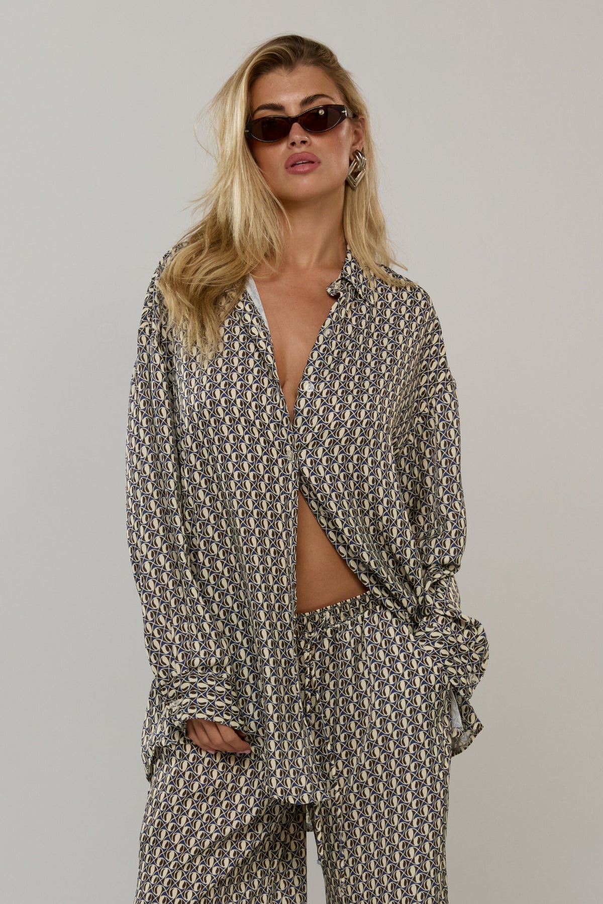 This is an image of Miley in Prism - RESA featuring a model wearing the dress