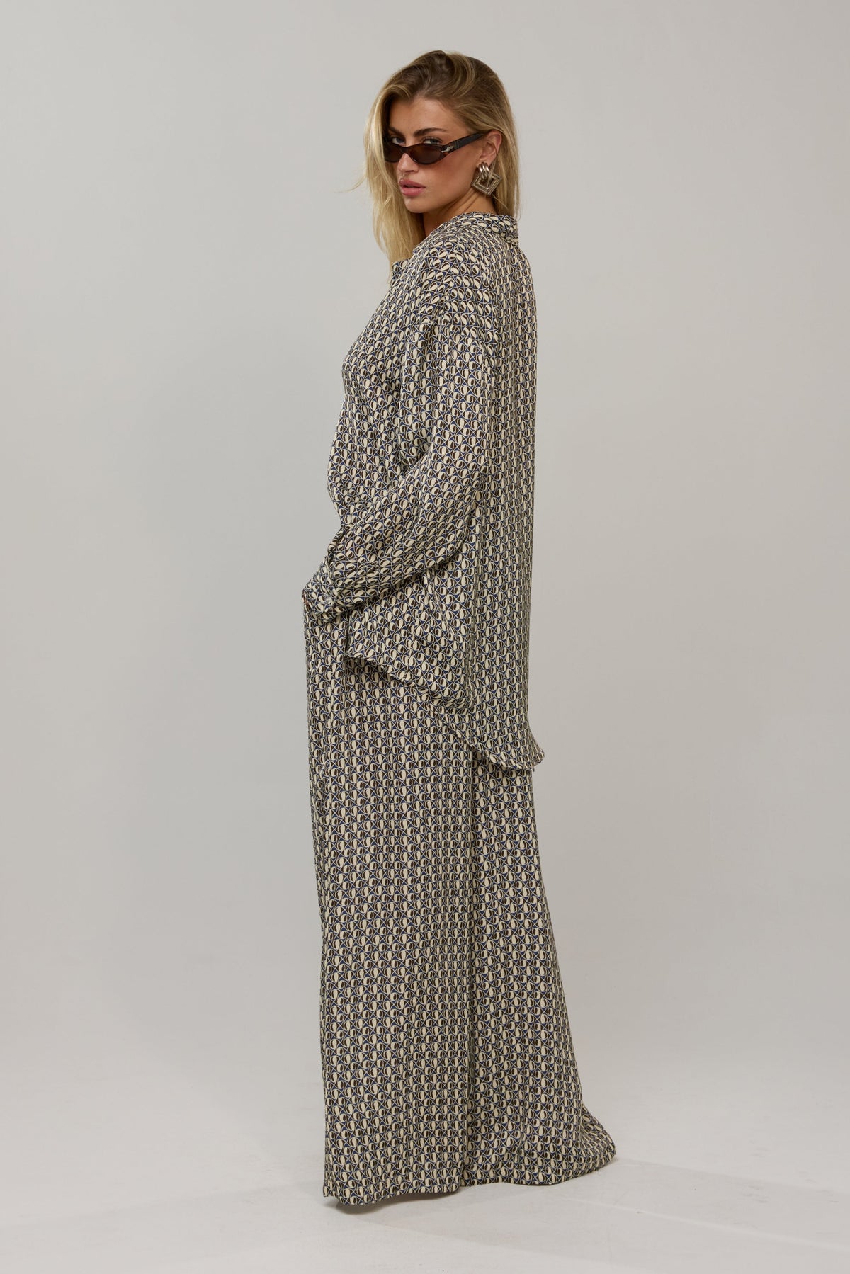This is an image of Miley in Prism - RESA featuring a model wearing the dress