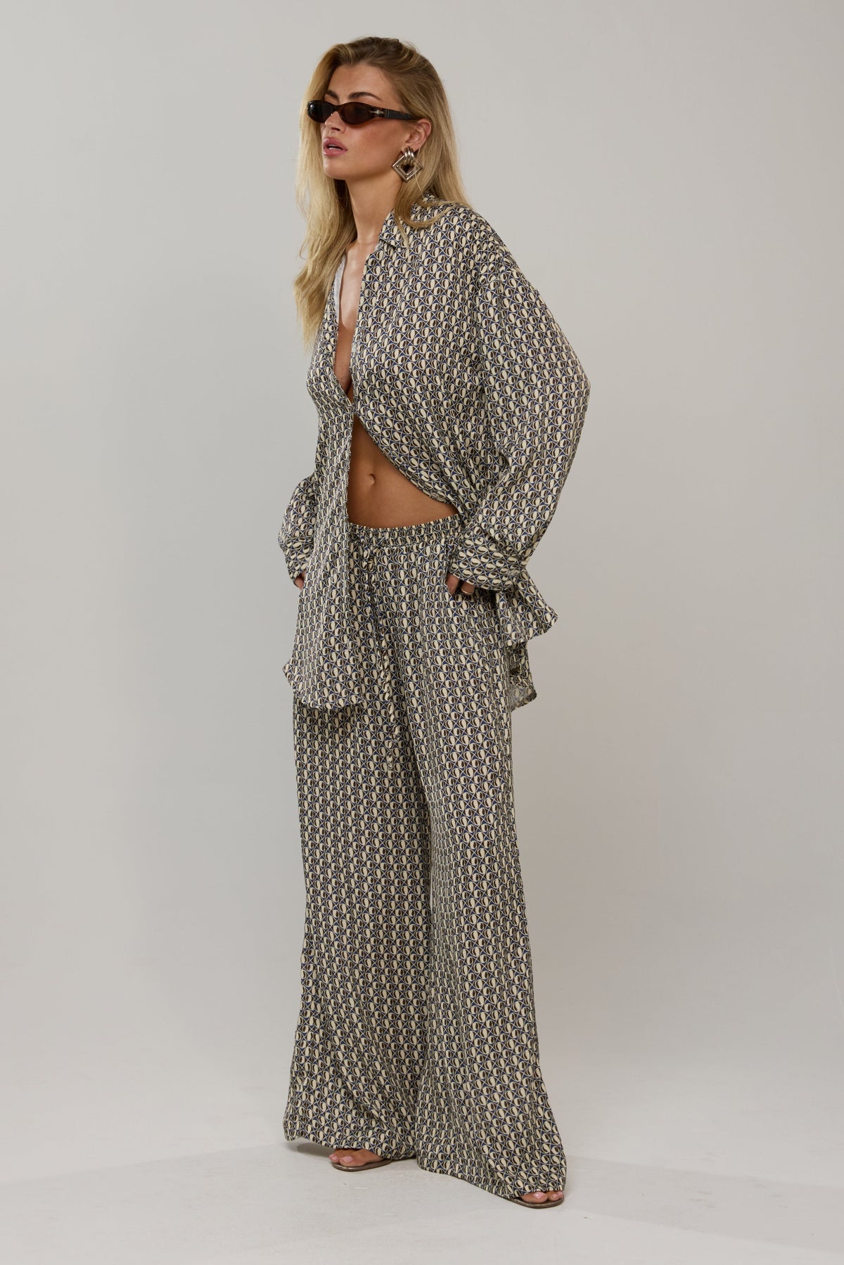 This is an image of Miley in Prism - RESA featuring a model wearing the dress