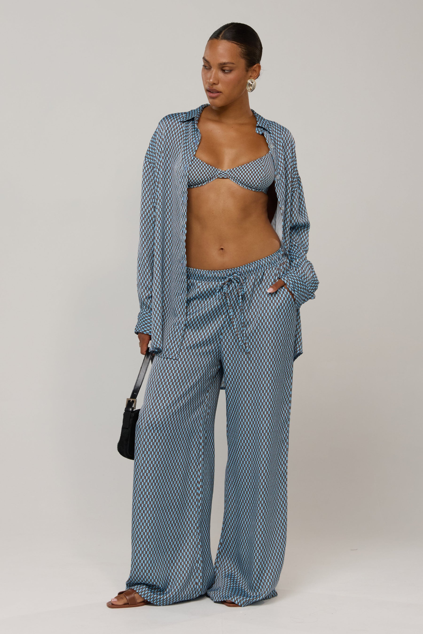 This is an image of Miley in Swell - RESA featuring a model wearing the dress