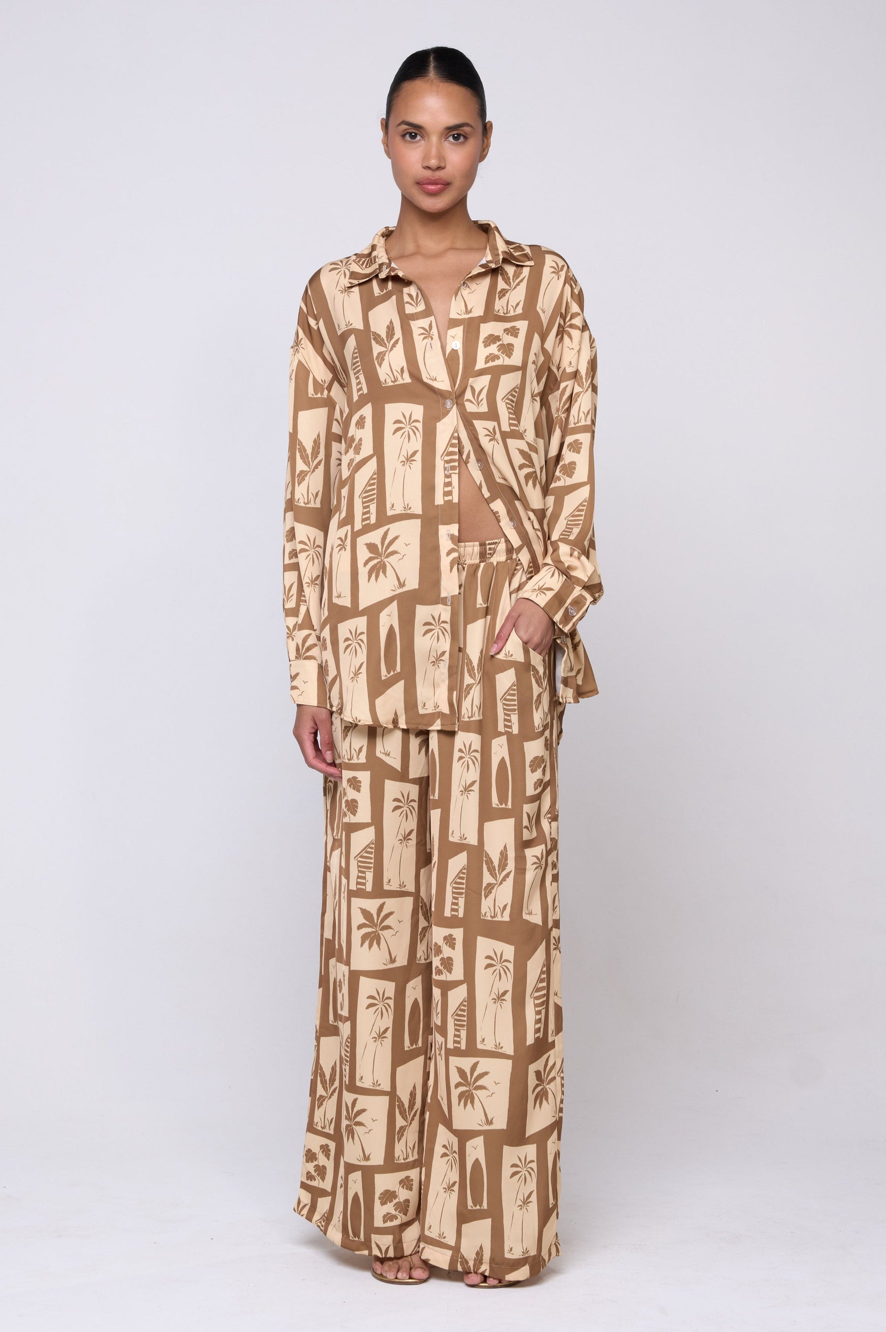 This is an image of Miley Set in Trestles - Archive - RESA featuring a model wearing the dress