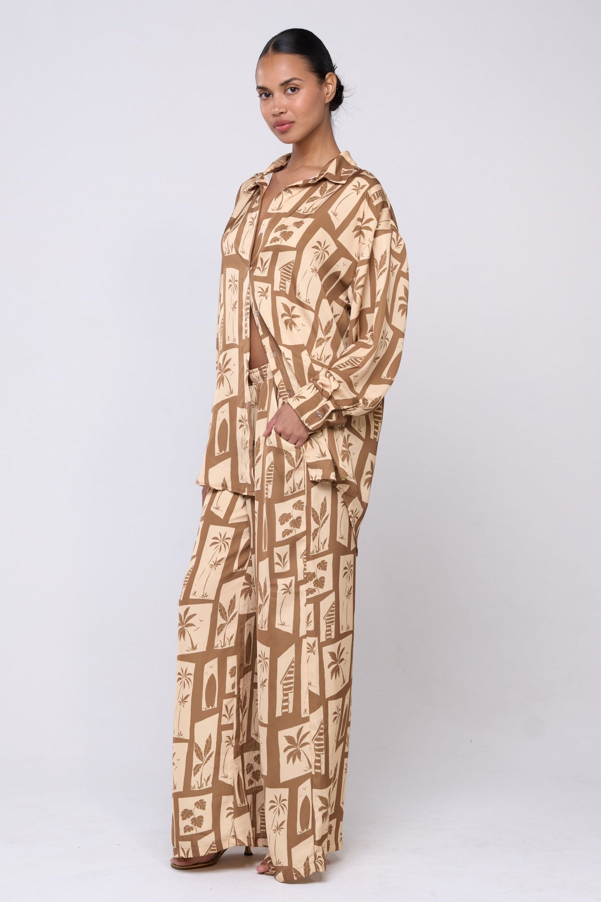 This is an image of Miley Set in Trestles - Archive - RESA featuring a model wearing the dress