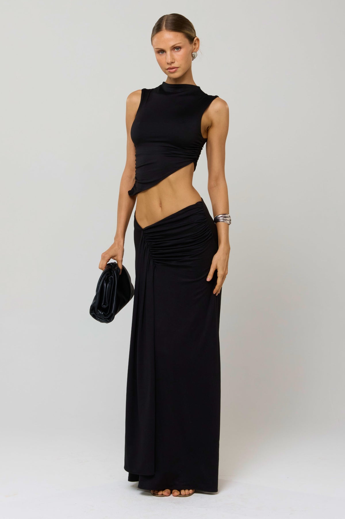 This is an image of Minka Top in Black Knit - RESA featuring a model wearing the dress