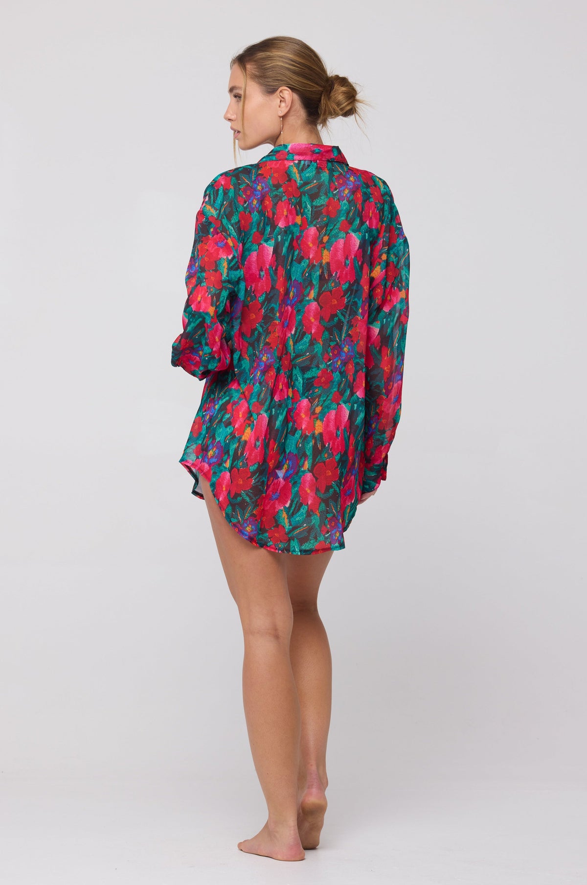 This is an image of Monica Chiffon Blouse in Resort - RESA featuring a model wearing the dress
