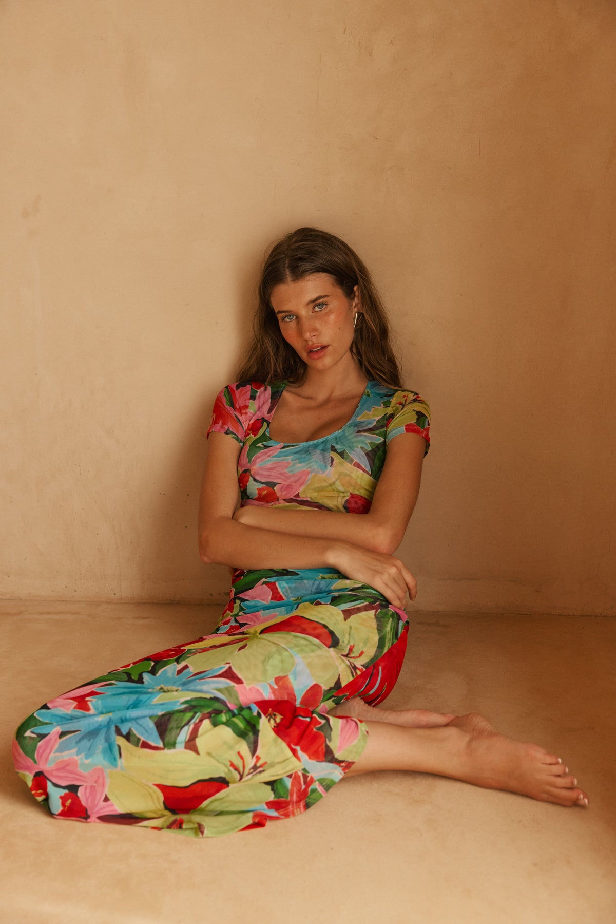 This is an image of Nari Dress in Tropicana - RESA featuring a model wearing the dress