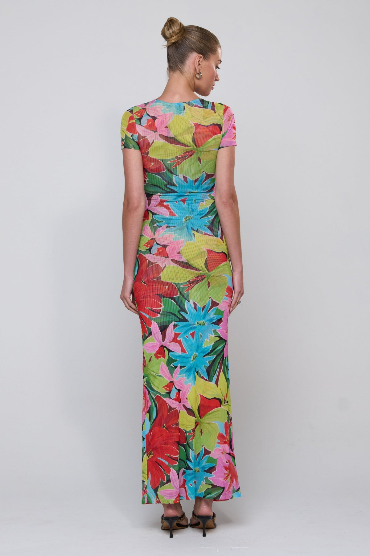 This is an image of Nari Dress in Tropicana - RESA featuring a model wearing the dress