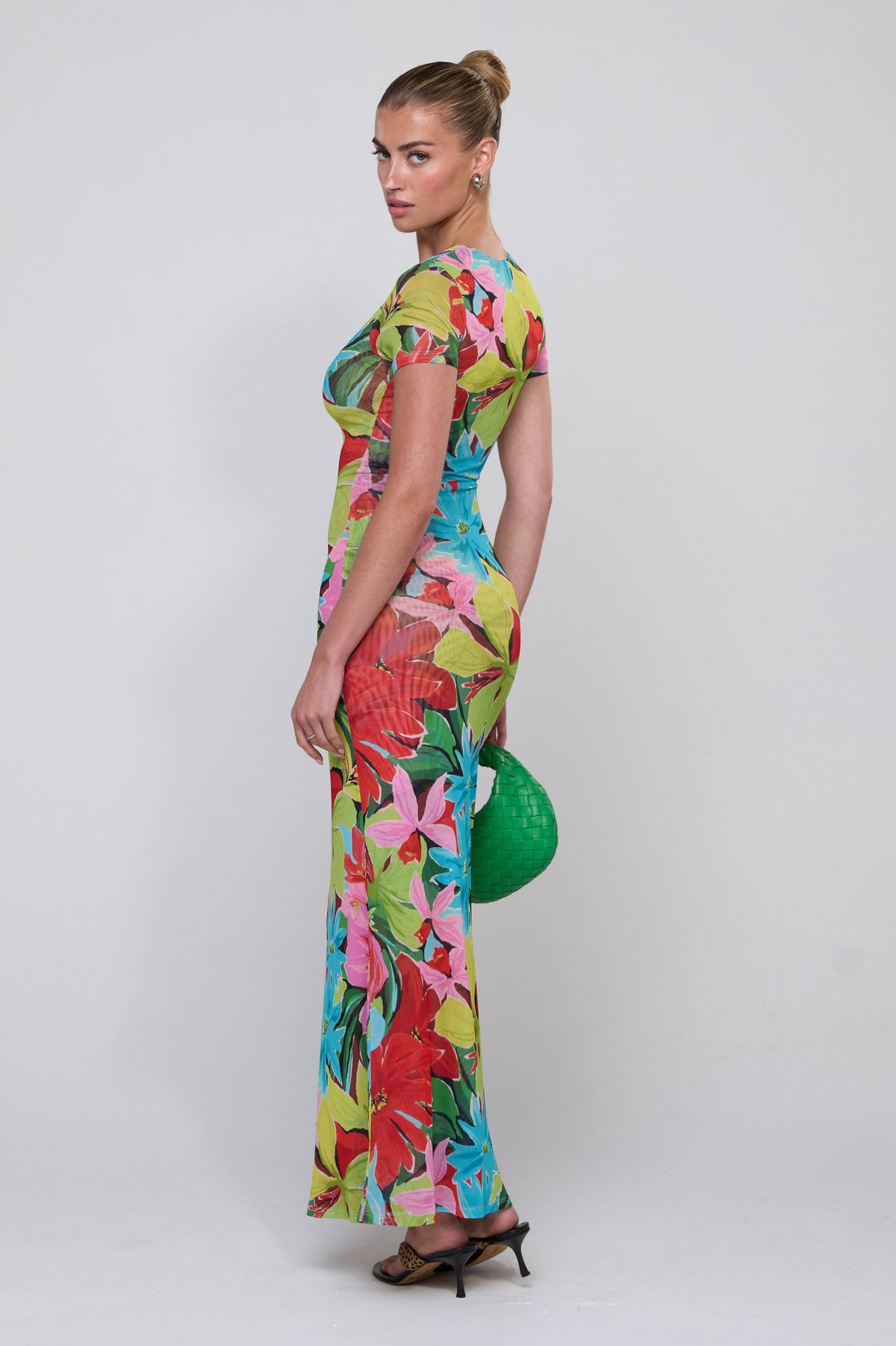 This is an image of Nari Dress in Tropicana - RESA featuring a model wearing the dress