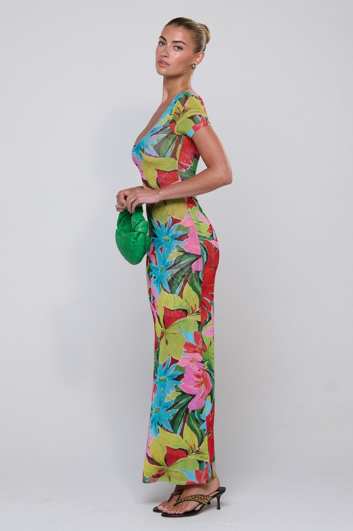 This is an image of Nari Dress in Tropicana - RESA featuring a model wearing the dress