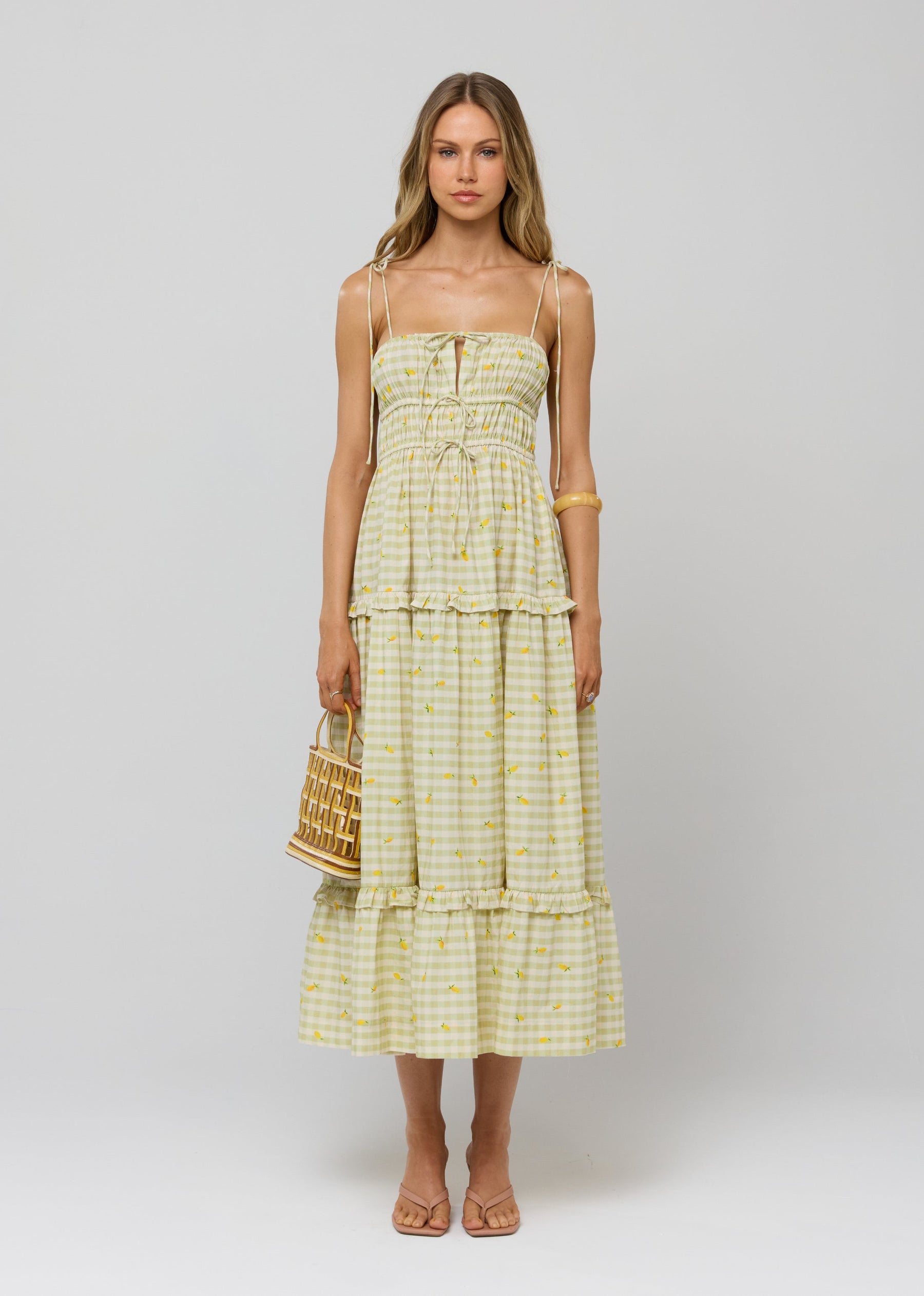 This is an image of Olivia Dress in Cotton Zest - RESA featuring a model wearing the dress