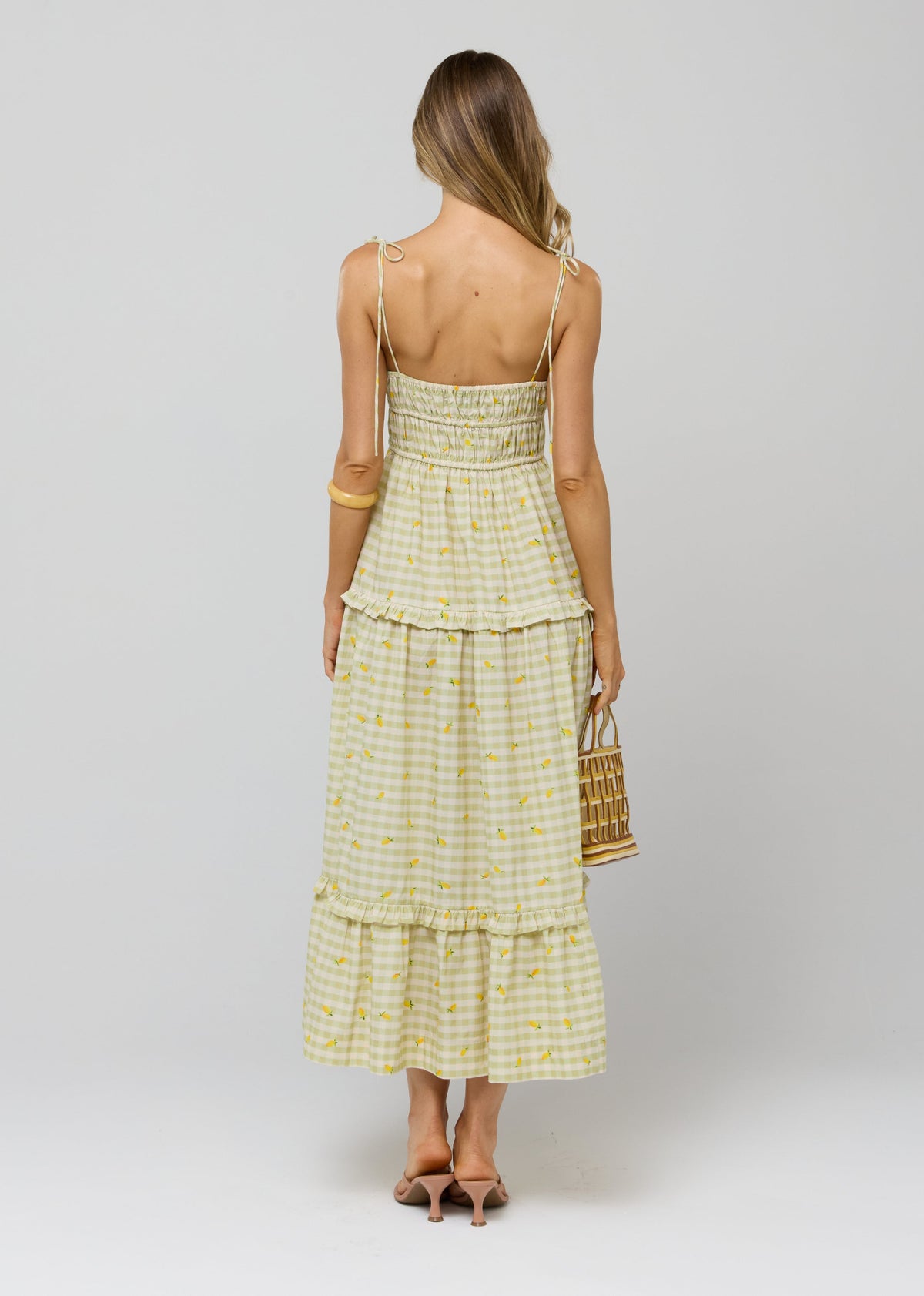 This is an image of Olivia Dress in Cotton Zest - RESA featuring a model wearing the dress