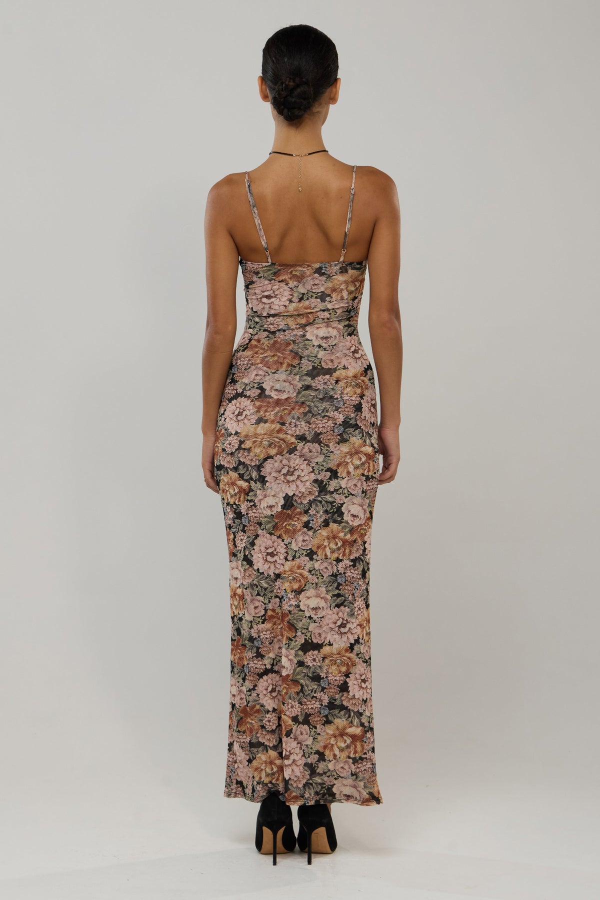 This is an image of Opal in Antique - RESA featuring a model wearing the dress
