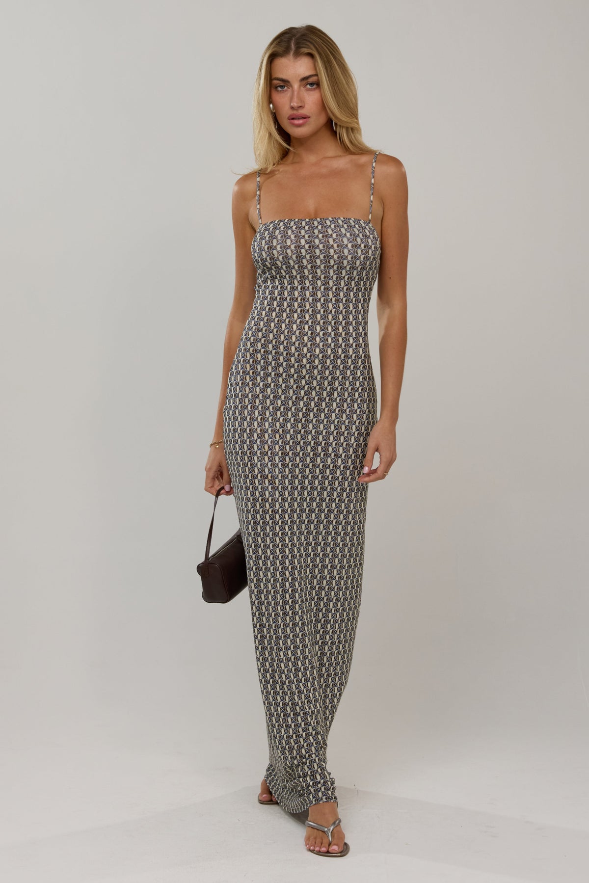 This is an image of Opal in Prism - RESA featuring a model wearing the dress