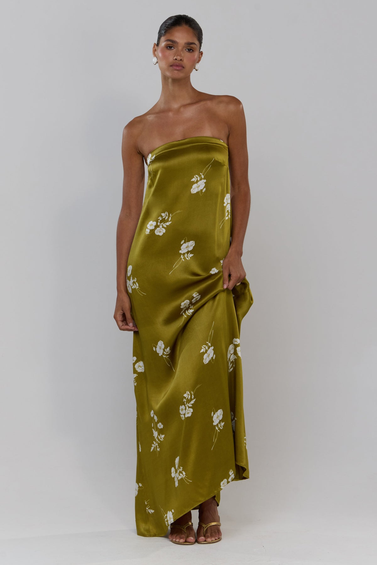 This is an image of Ophelia in Moss - RESA featuring a model wearing the dress