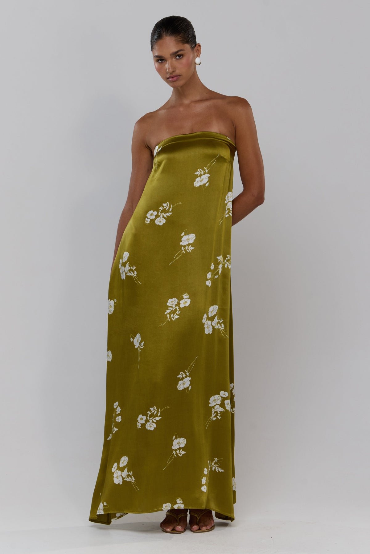 This is an image of Ophelia in Moss - RESA featuring a model wearing the dress
