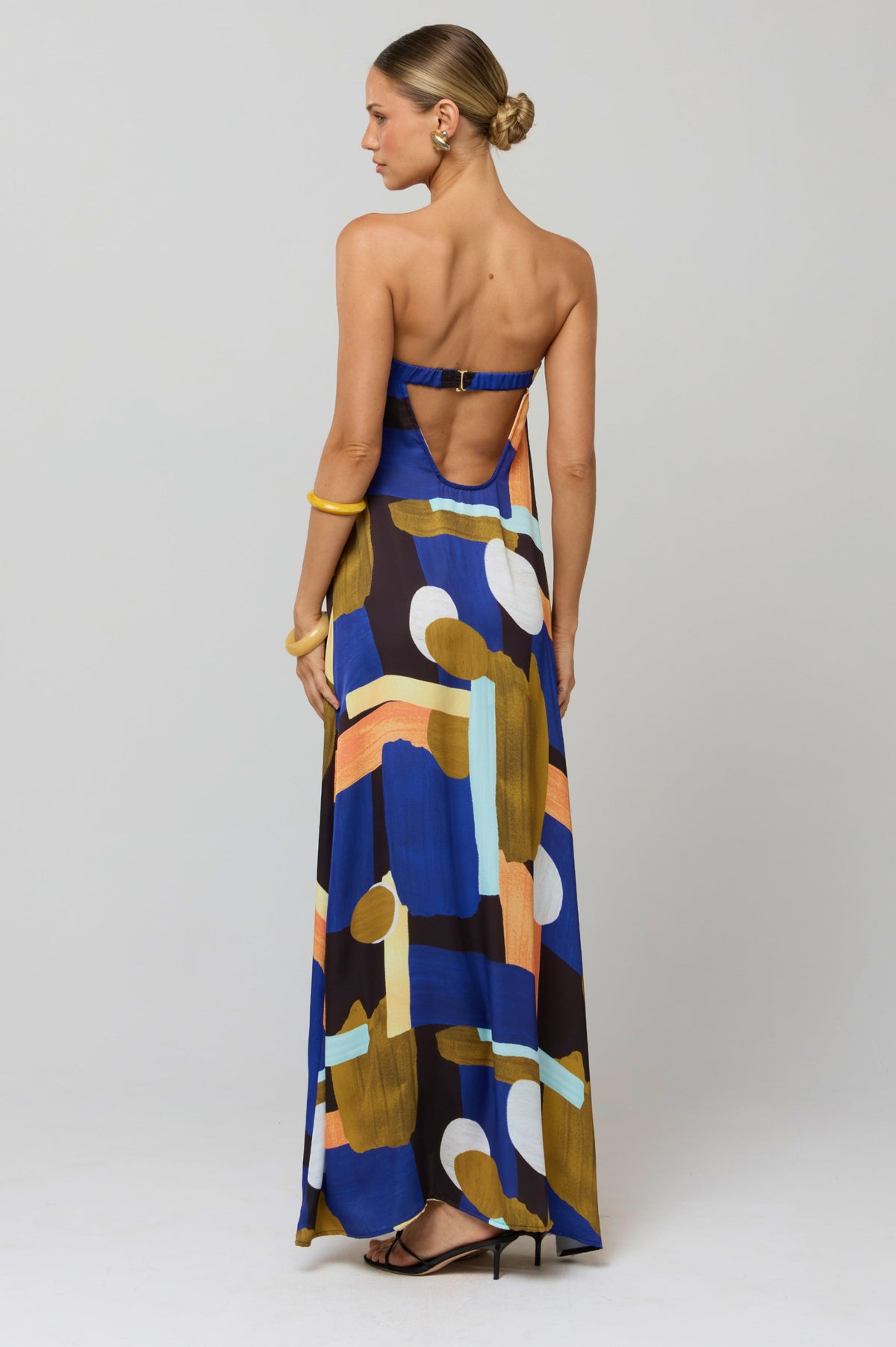 This is an image of Ophelia Maxi Dress in Deco - RESA featuring a model wearing the dress