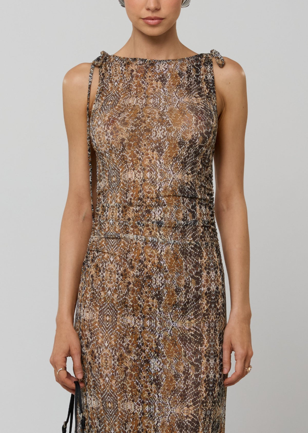 This is an image of Paige Dress in Serpent - RESA featuring a model wearing the dress