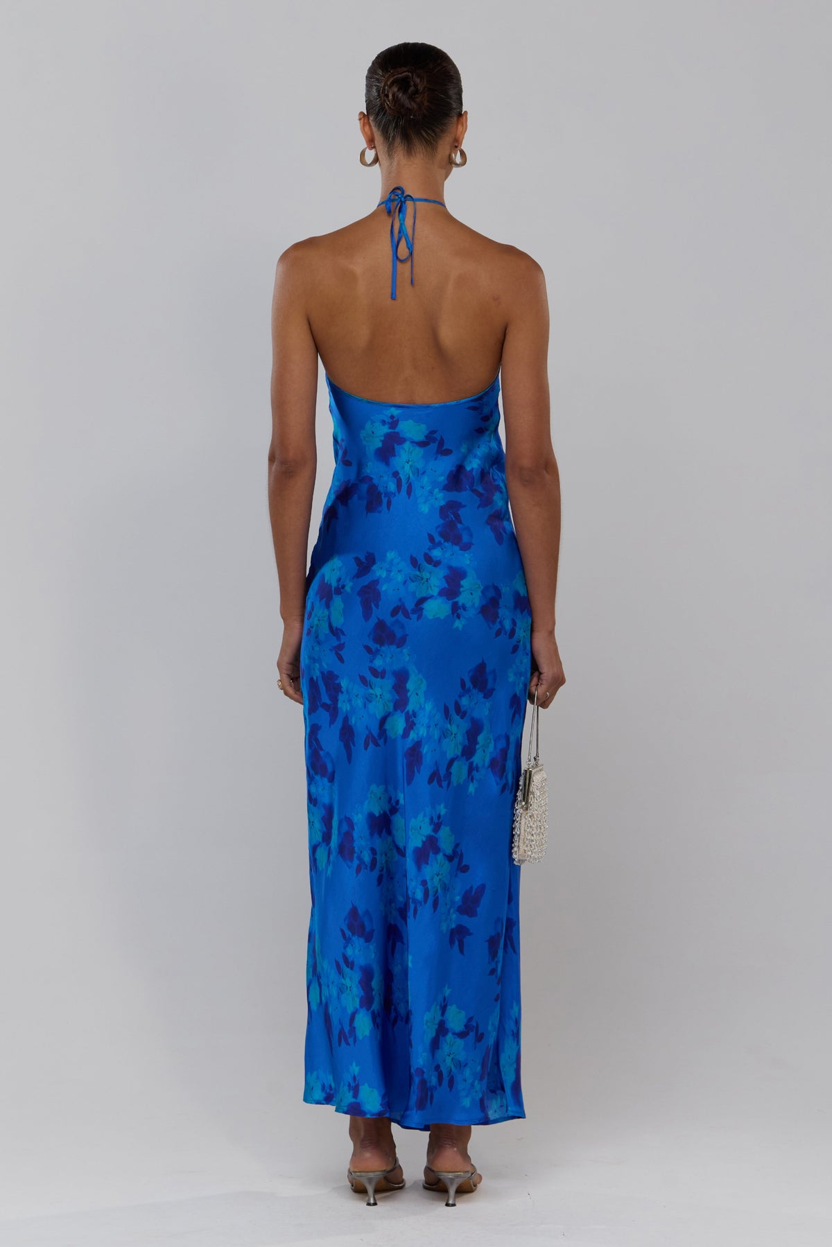 This is an image of Pam in Azul - RESA featuring a model wearing the dress