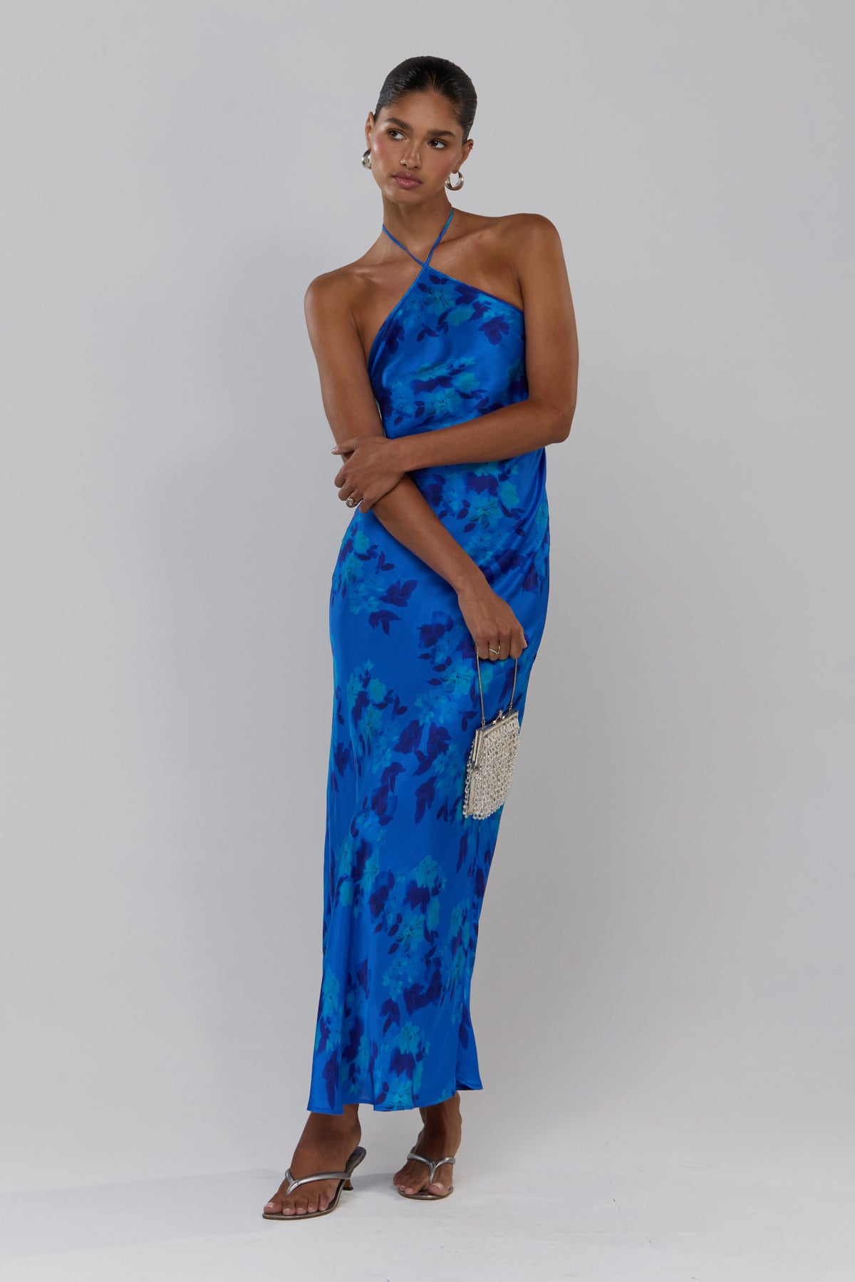 This is an image of Pam in Azul - RESA featuring a model wearing the dress