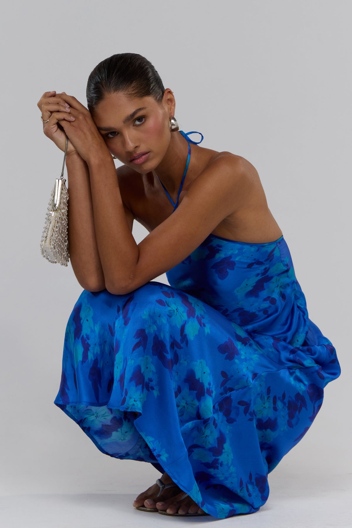 This is an image of Pam in Azul - RESA featuring a model wearing the dress
