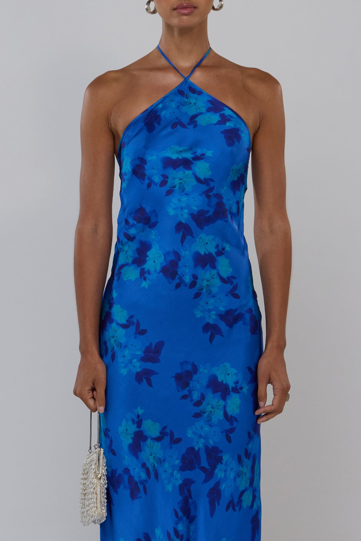 This is an image of Pam in Azul - RESA featuring a model wearing the dress