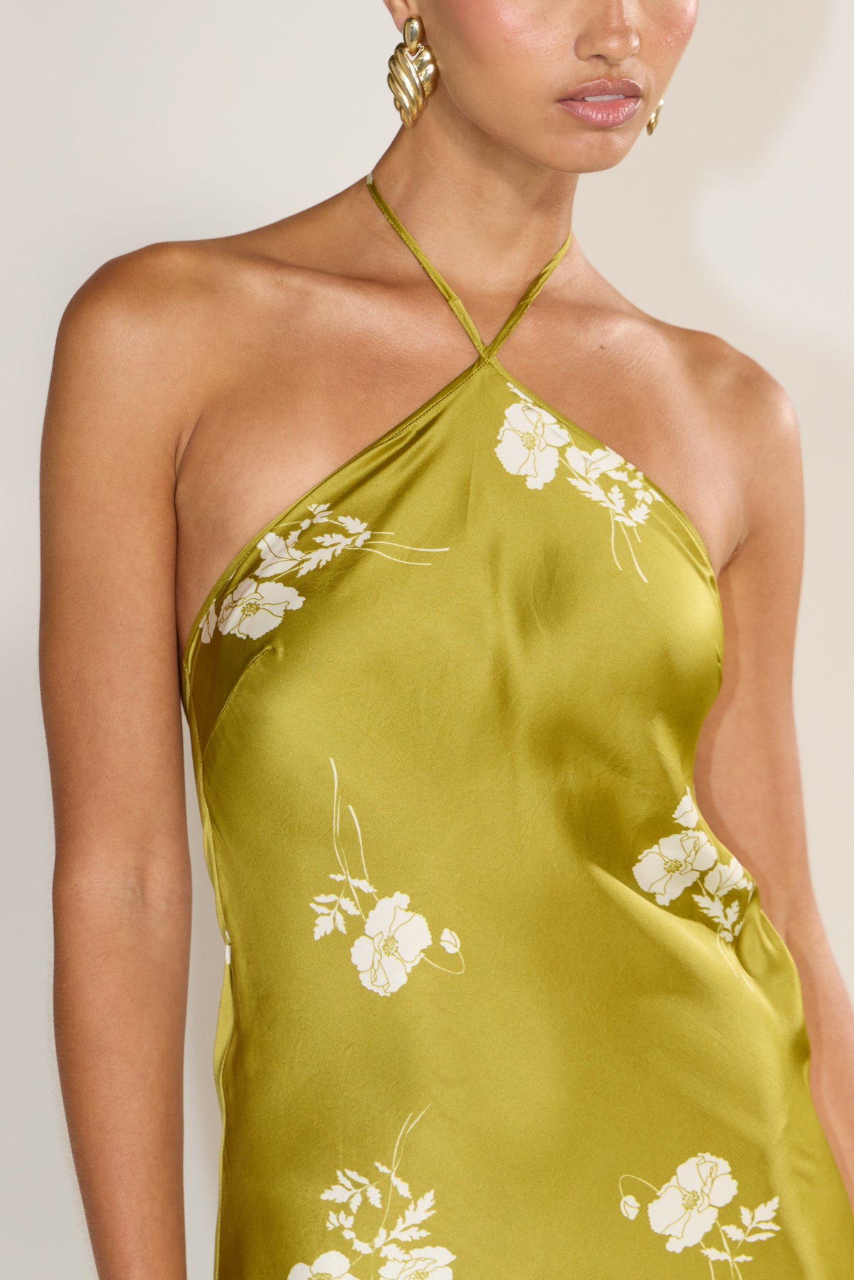 This is an image of Pam in Moss - RESA featuring a model wearing the dress