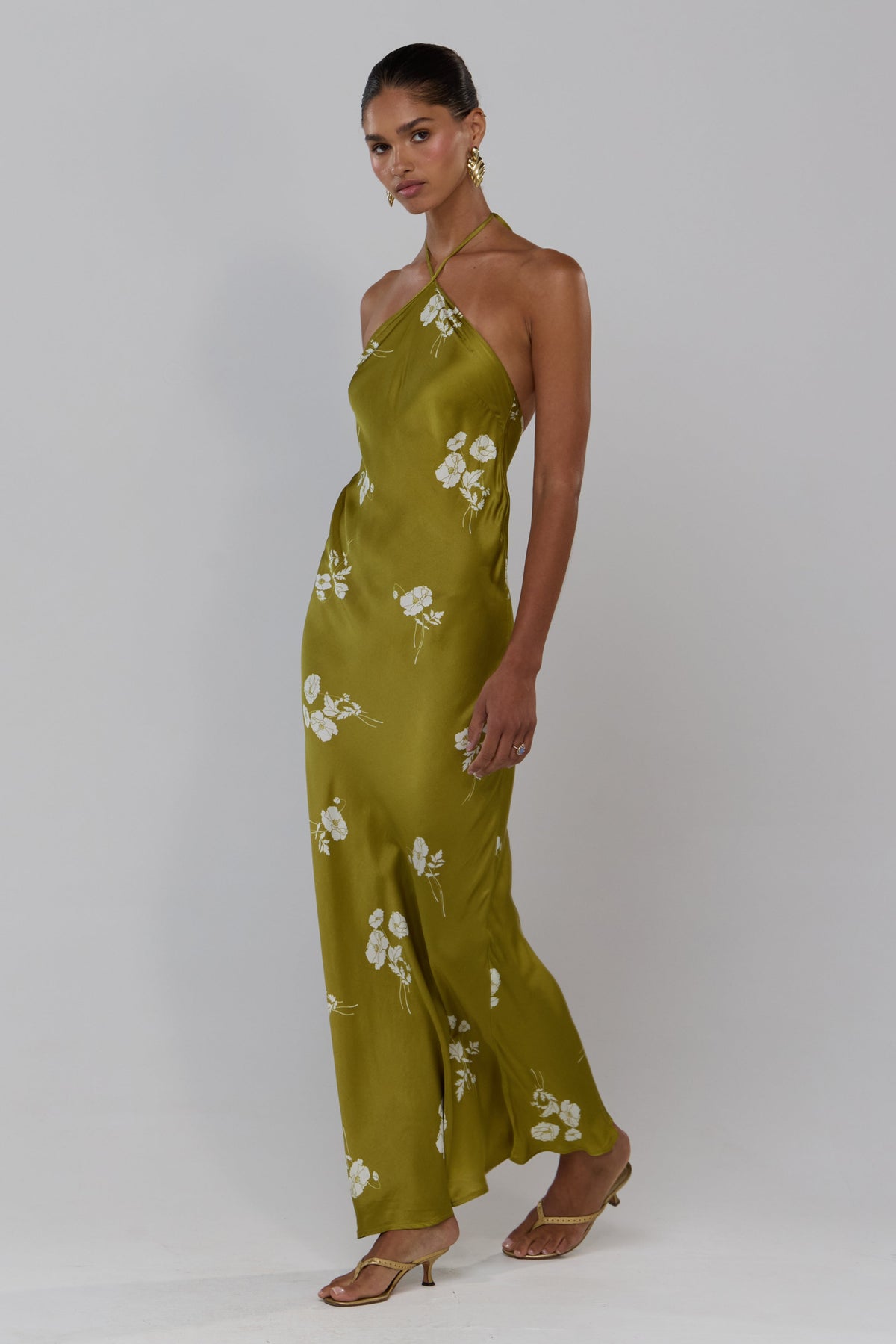 This is an image of Pam in Moss - RESA featuring a model wearing the dress