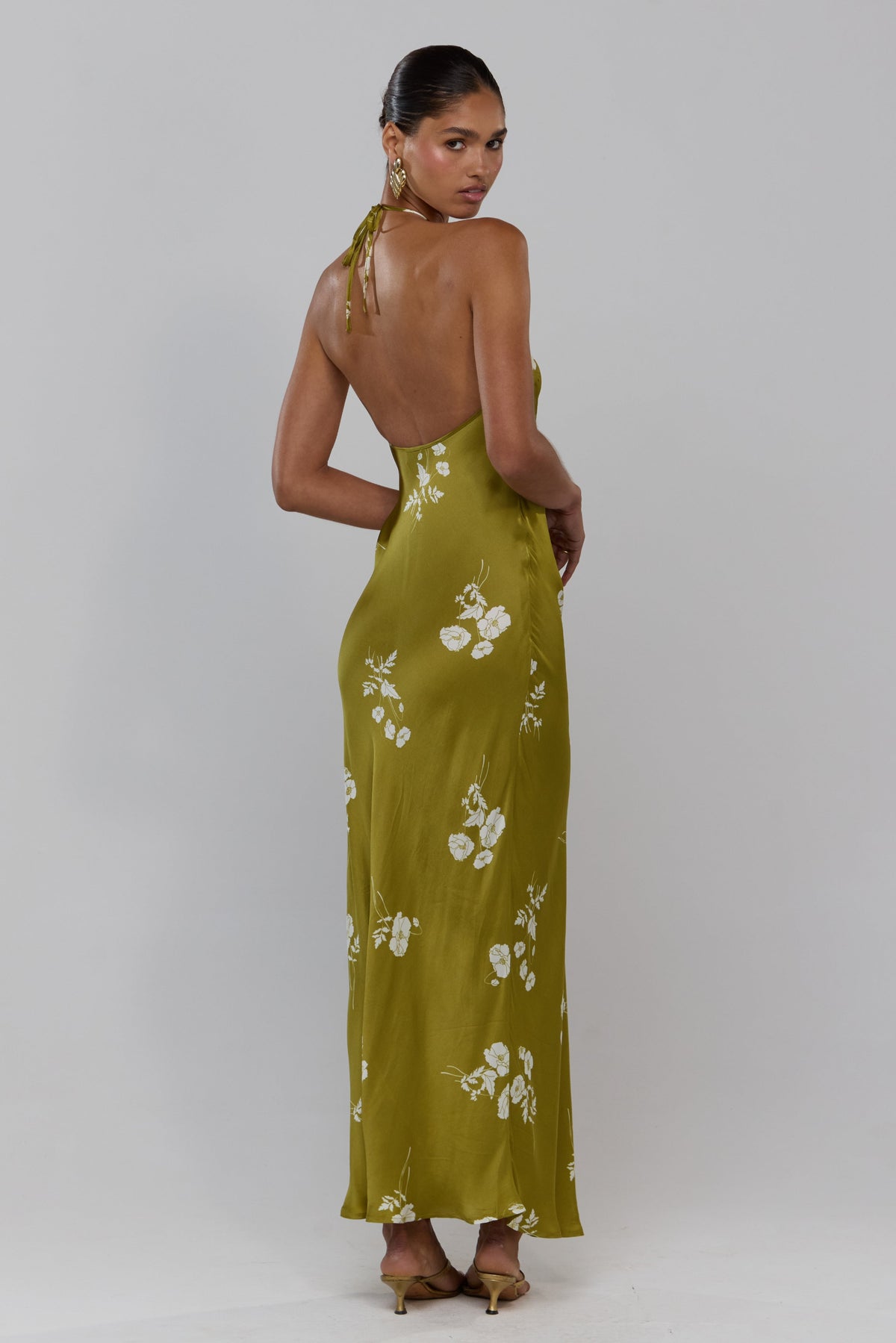 This is an image of Pam in Moss - RESA featuring a model wearing the dress