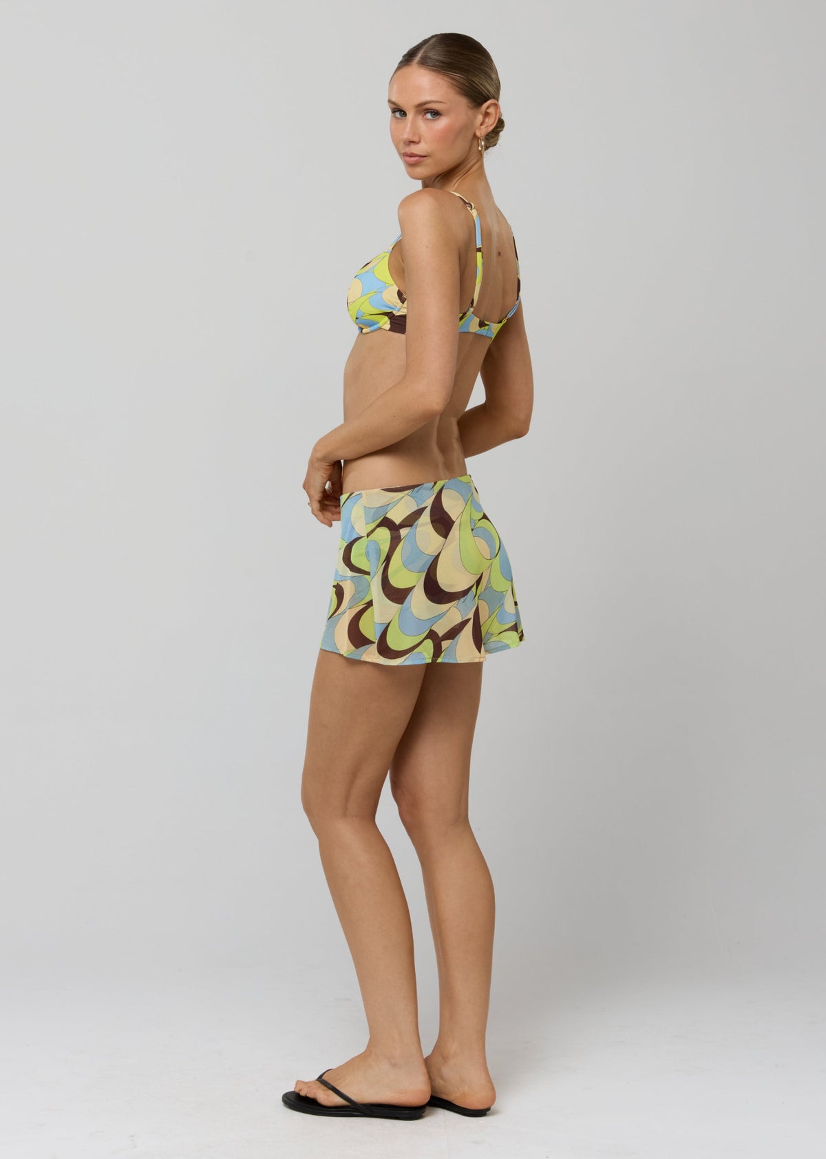 This is an image of Paola Skort in Palm Royale - RESA featuring a model wearing the dress